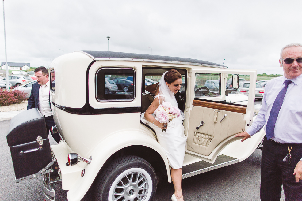 Bride in a wedding car