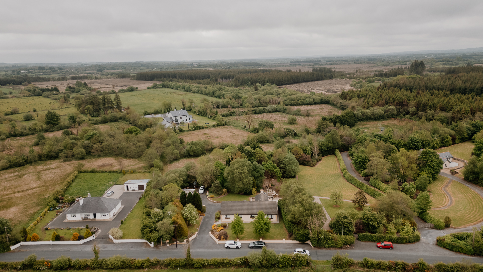 A landscape with trees and buildings