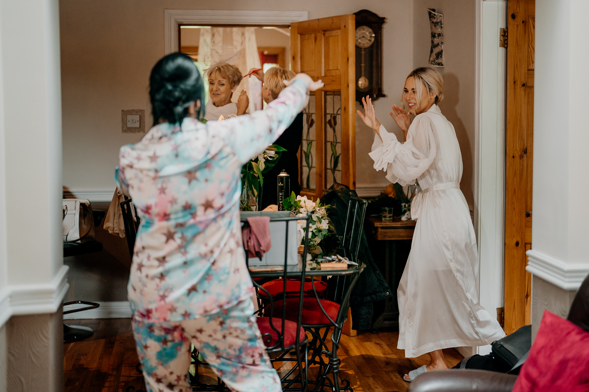 A person in a white dress and a person in a white dress