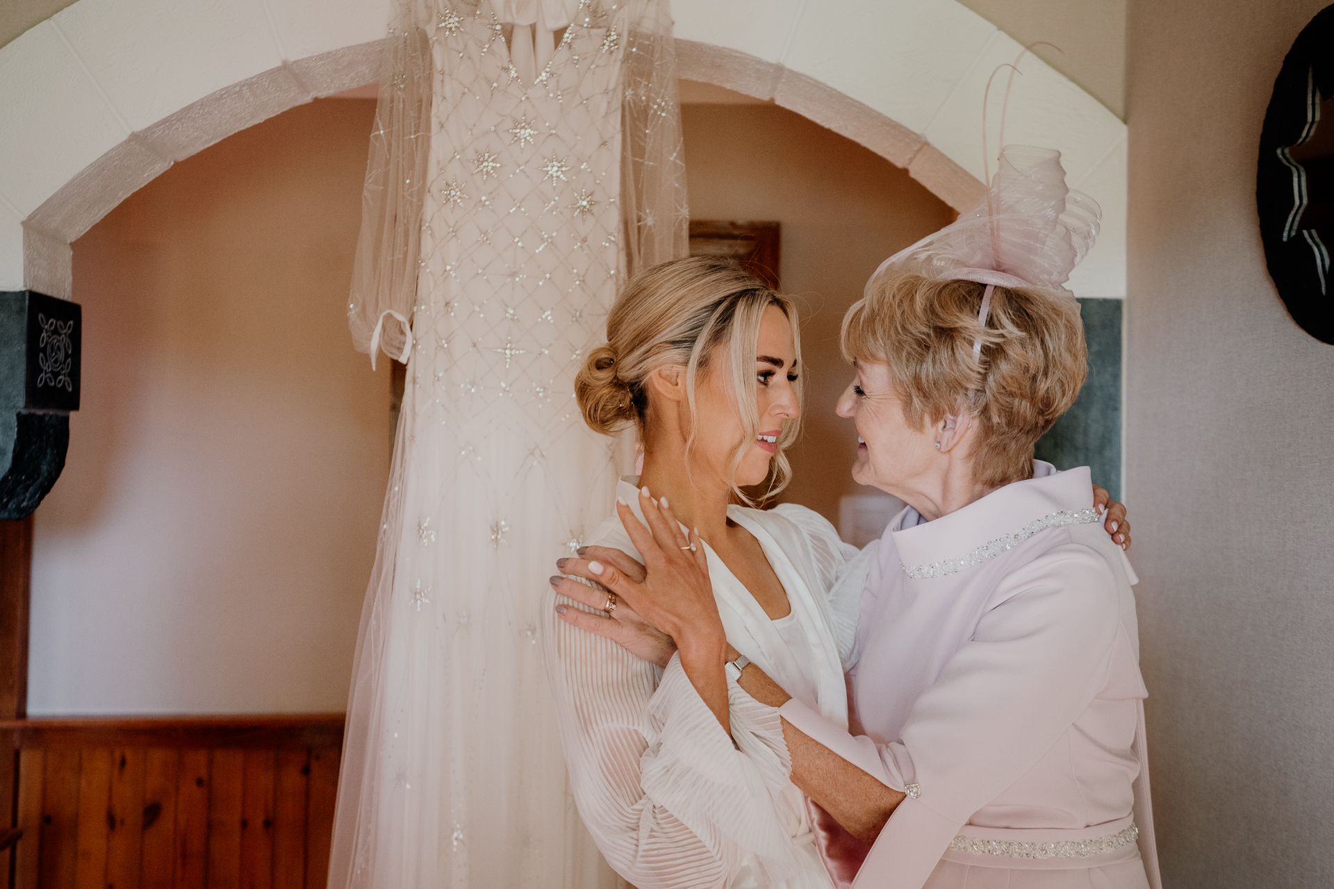 A person in a white dress and a person in a white dress