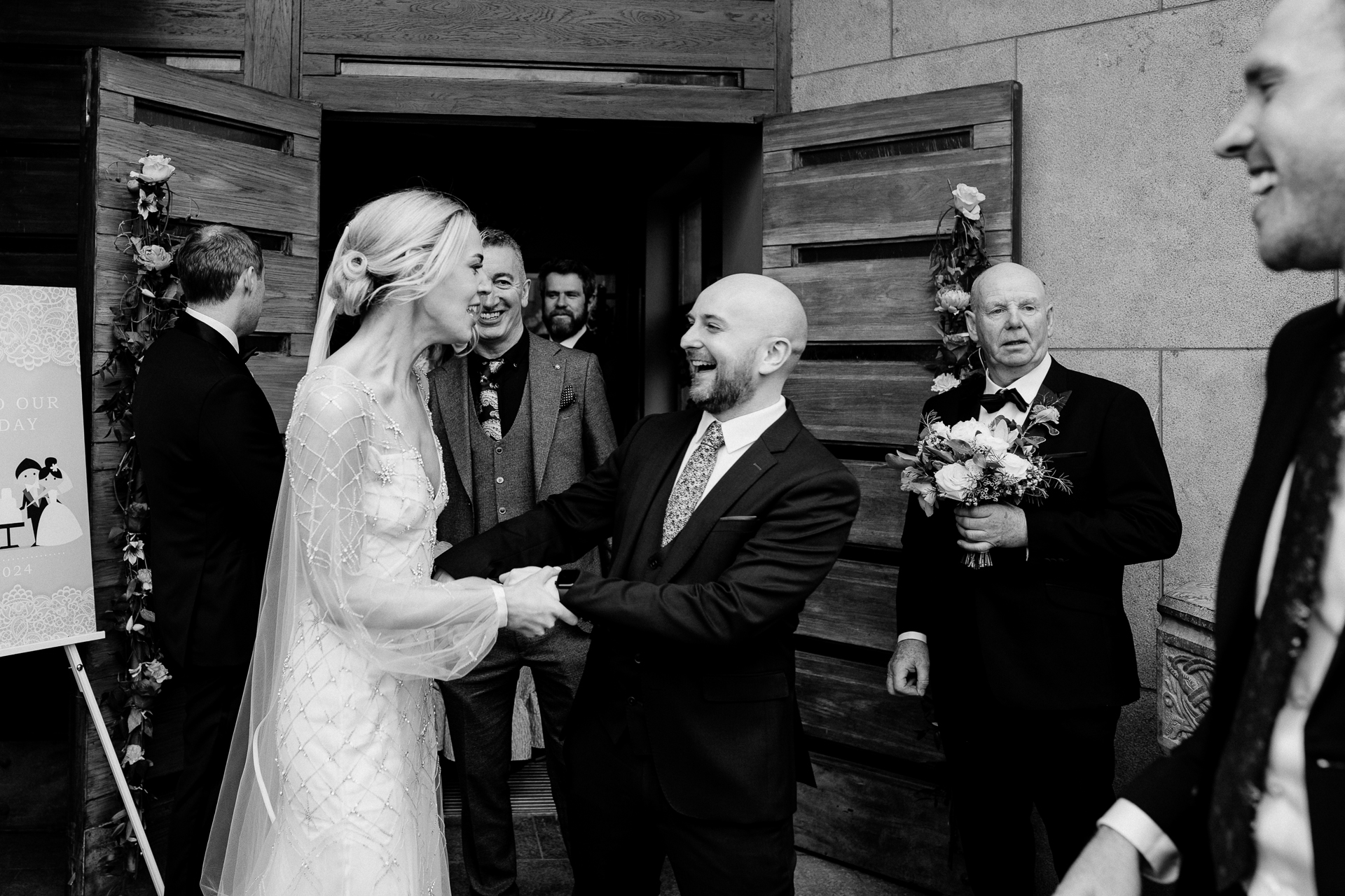 A bride and groom walking down the aisle