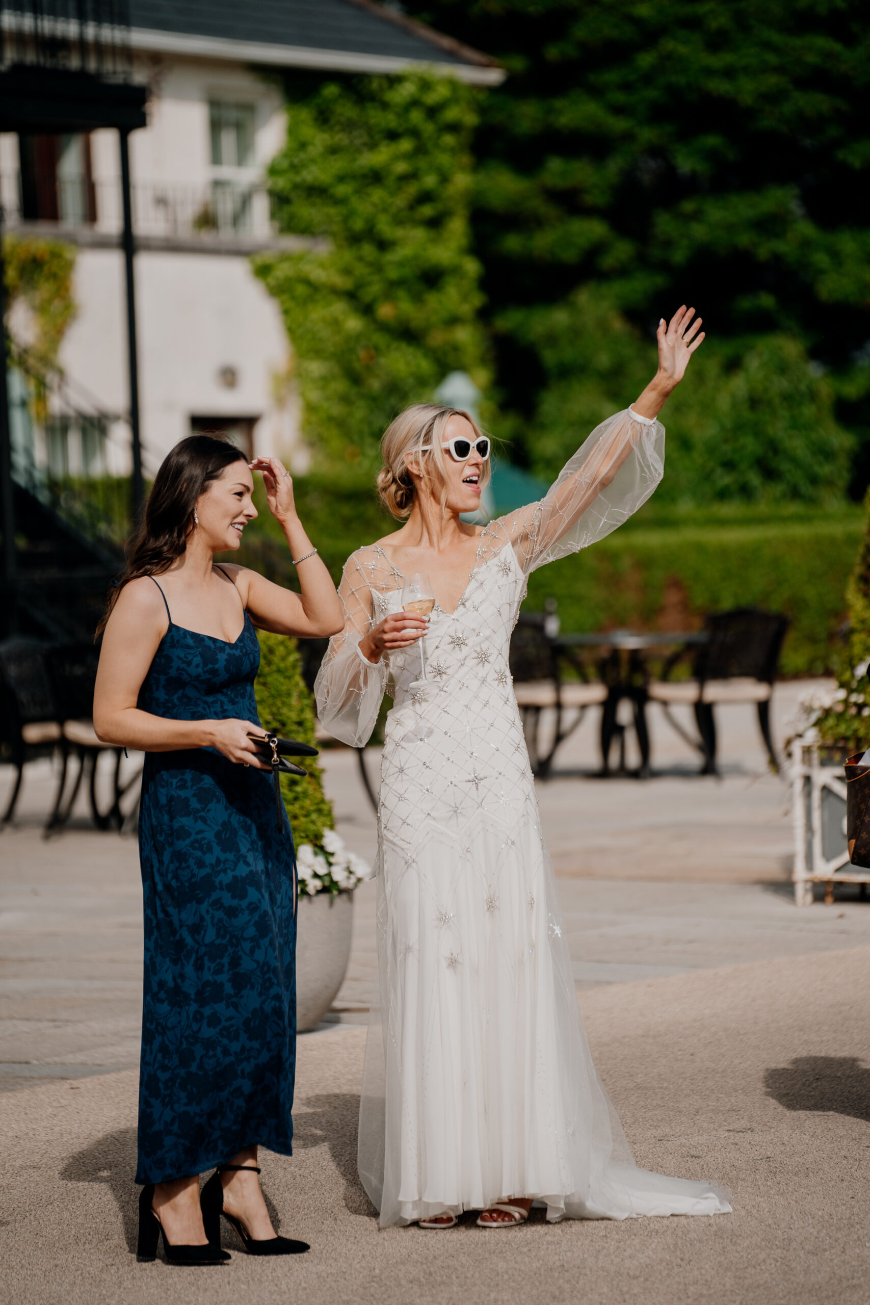 A woman in a white dress and a woman in a blue dress