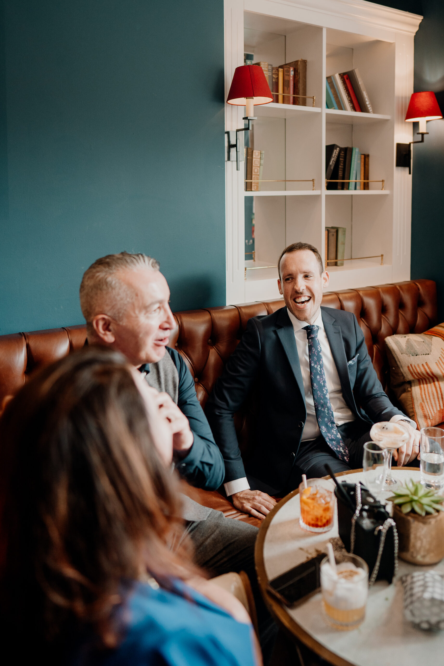 A group of people sitting in a room