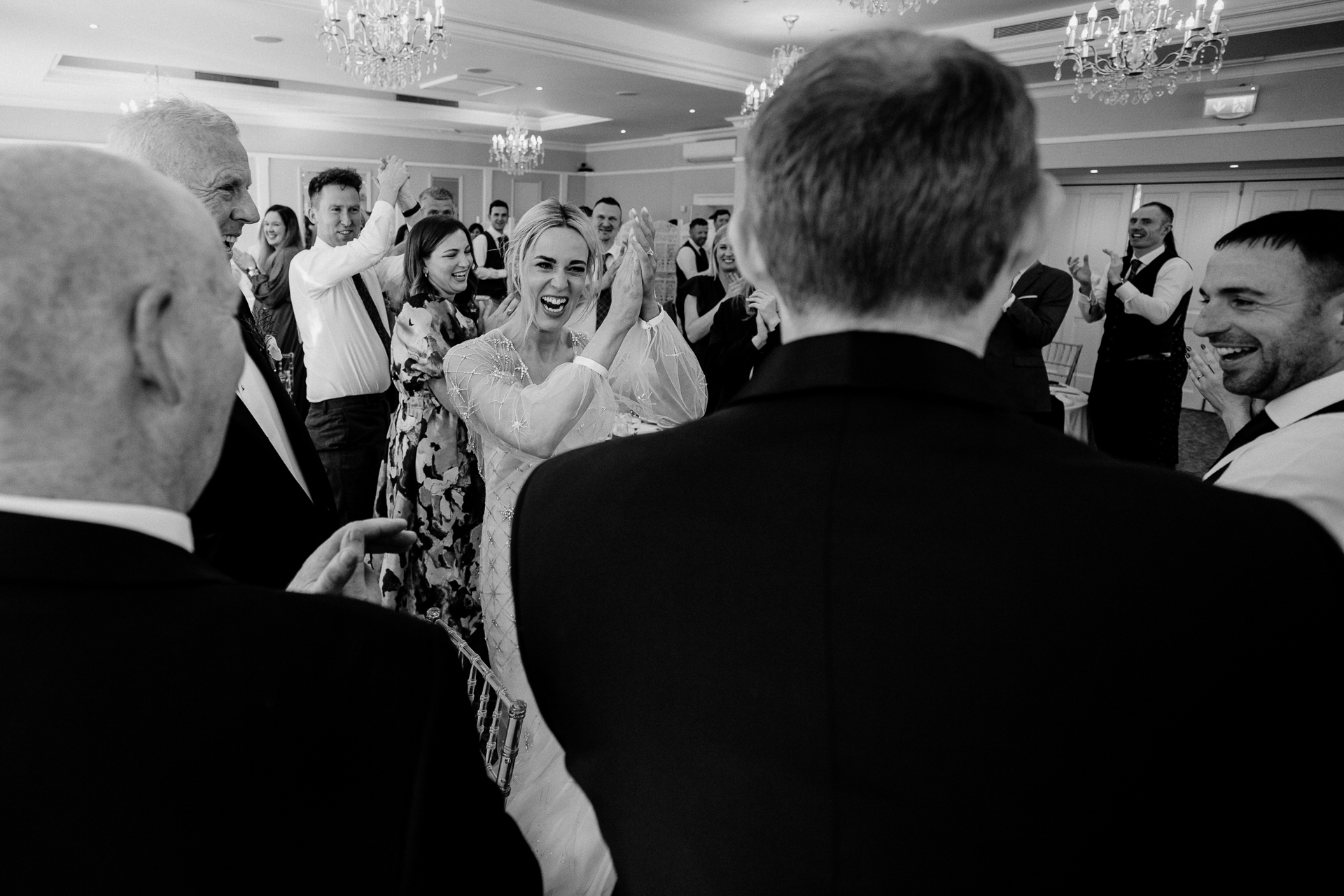 A man in a suit and a woman in a dress