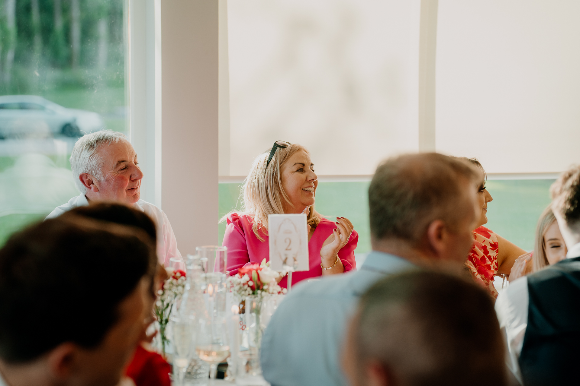 A group of people sitting at a table