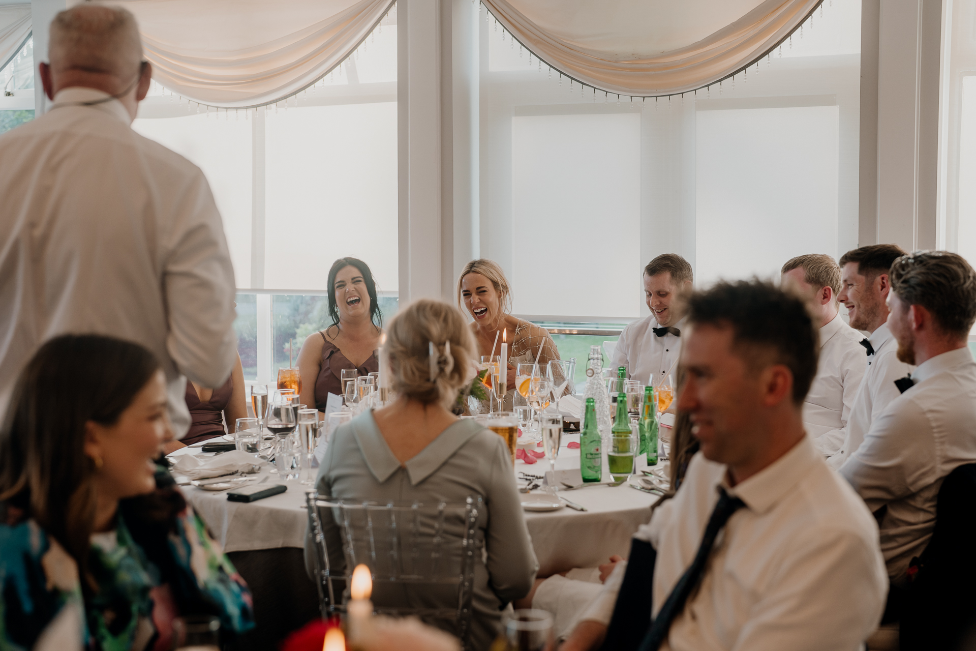 A group of people sitting around a table