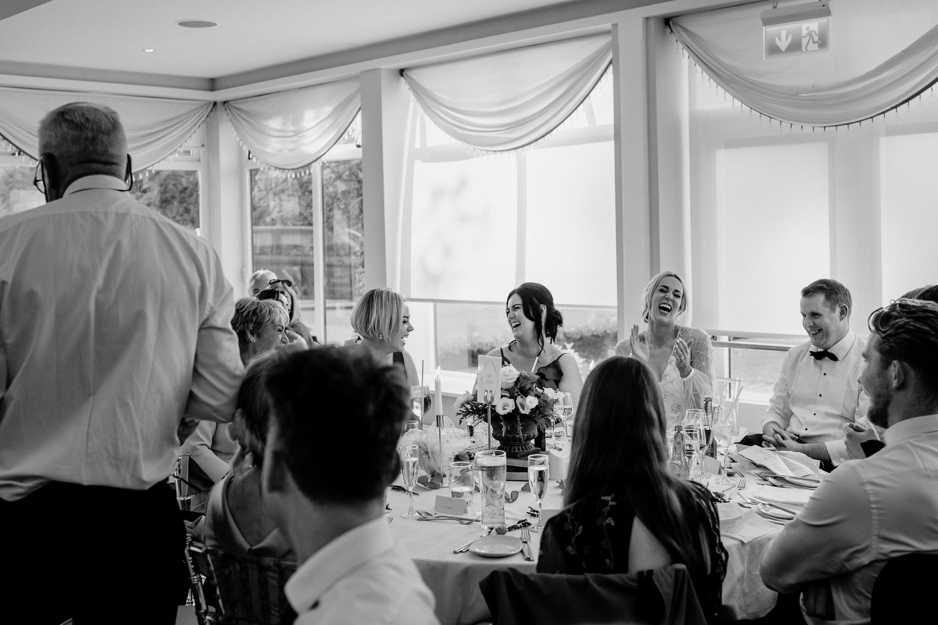 A group of people sitting around a table