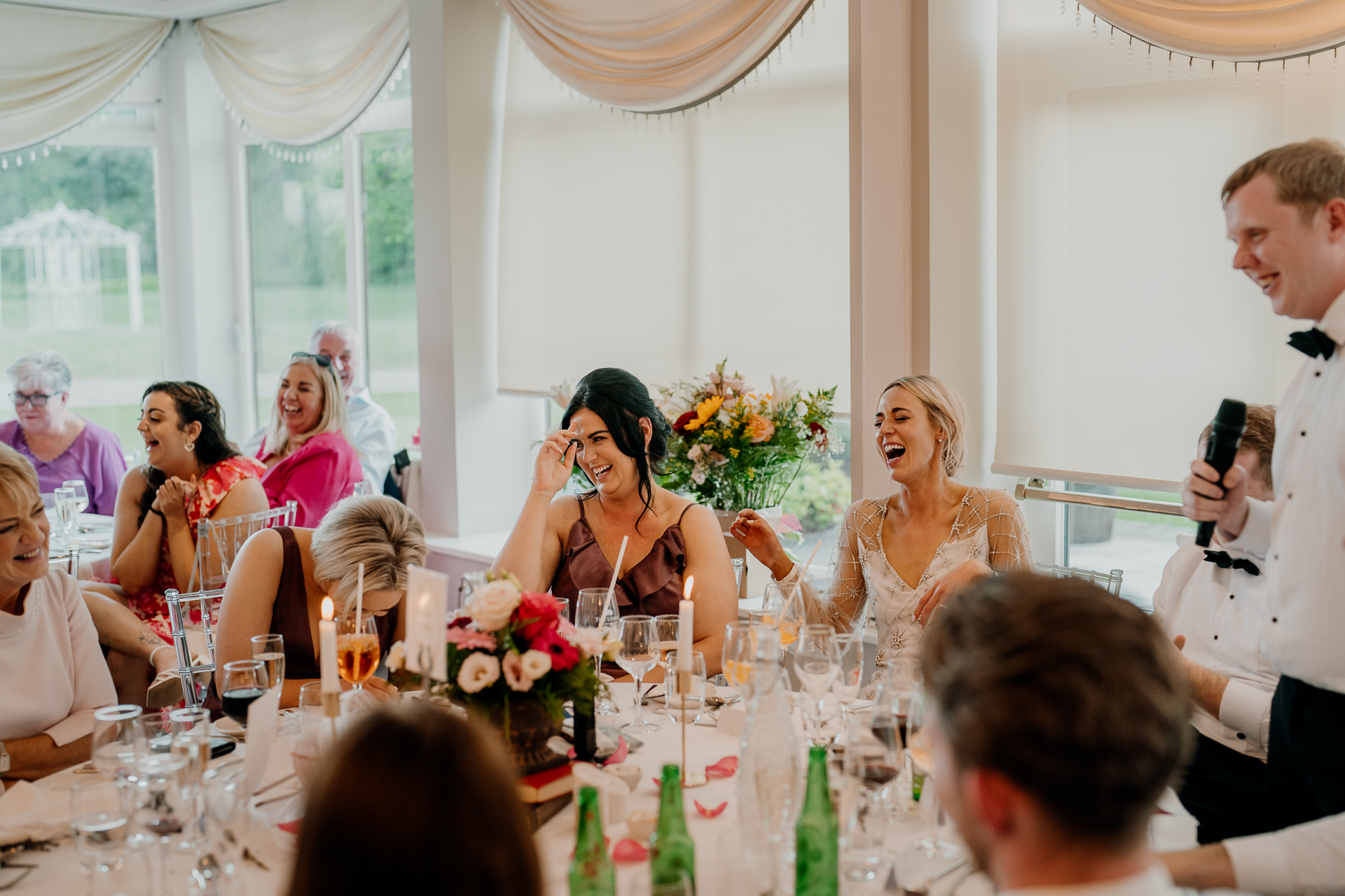 A group of people sitting at a table