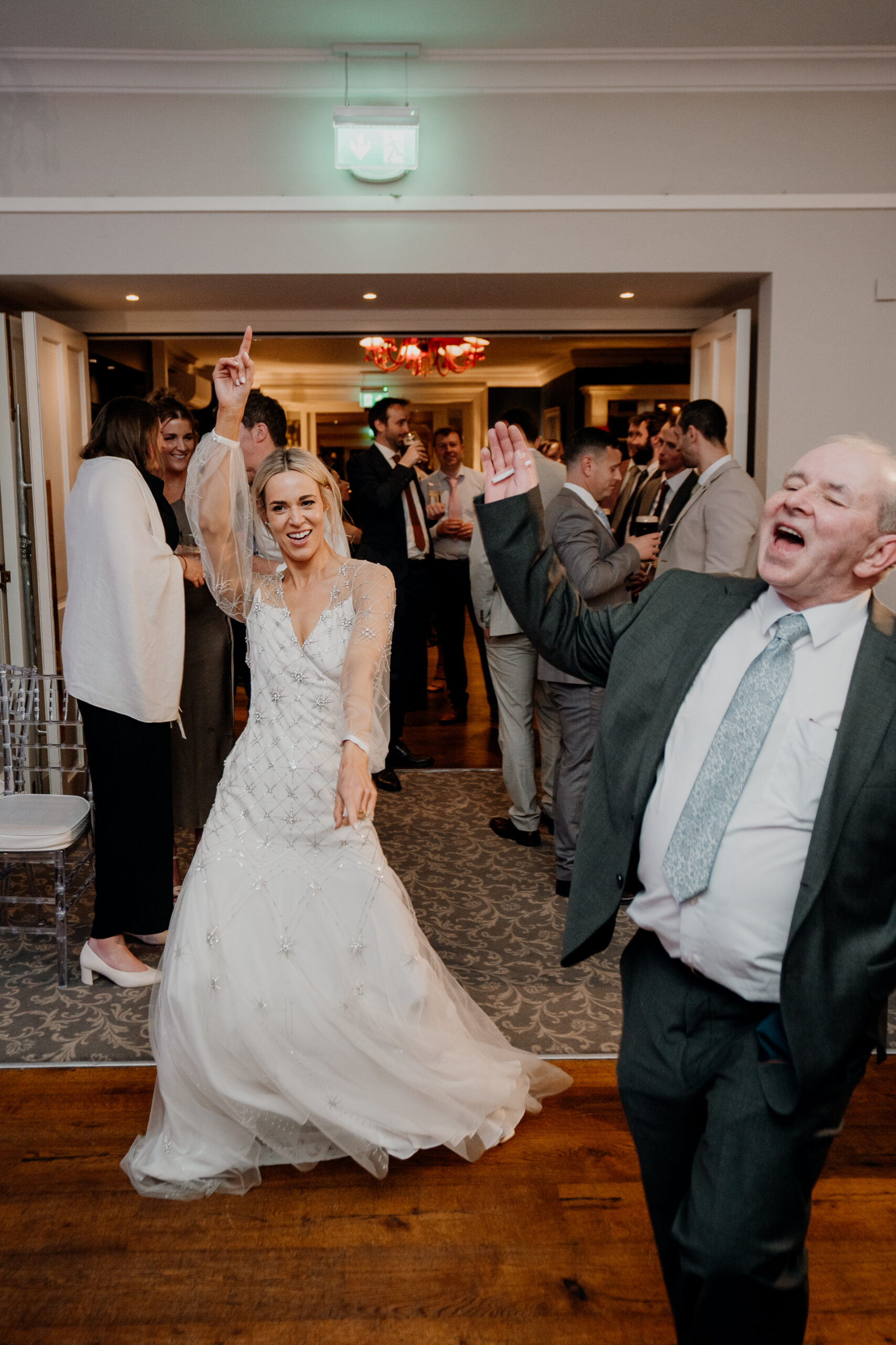 A bride and groom dancing