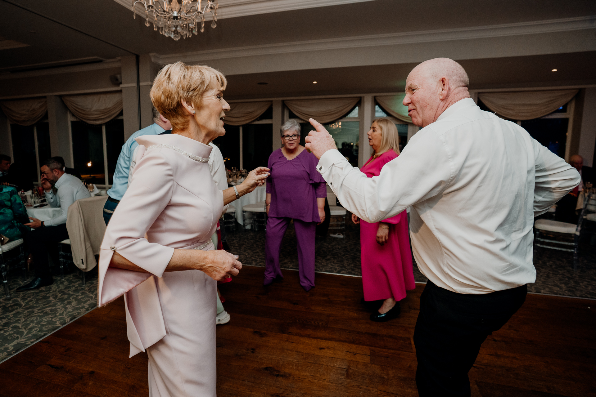 A man and a woman shaking hands