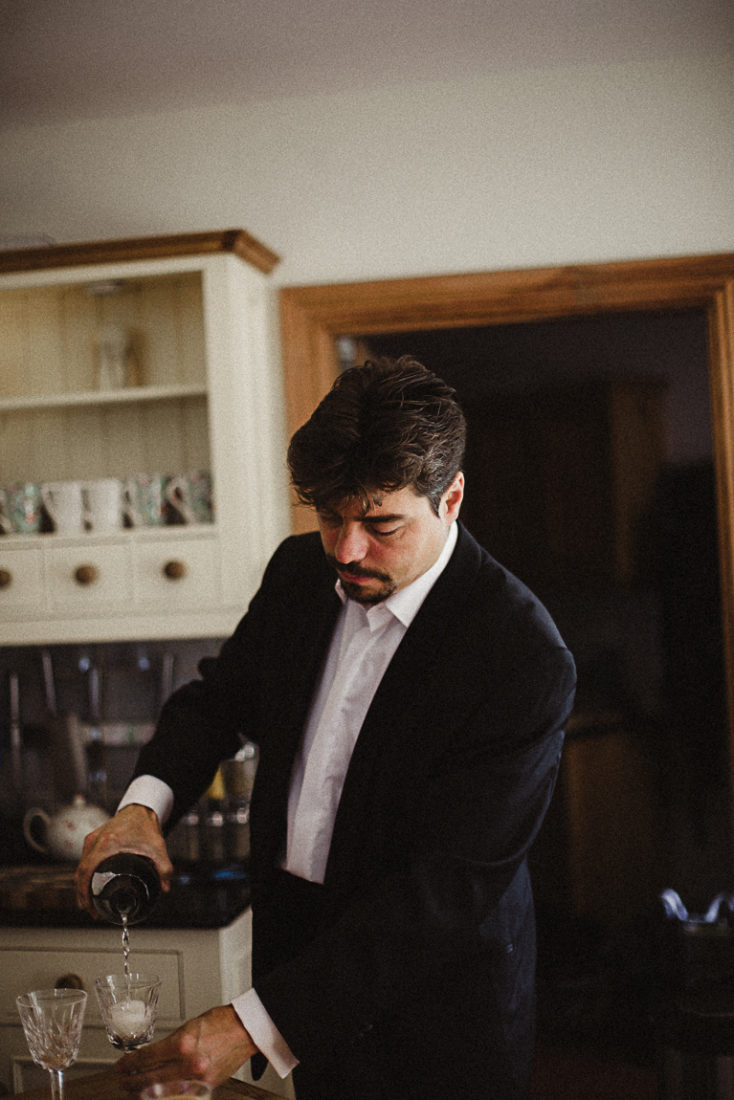 A man standing in a kitchen