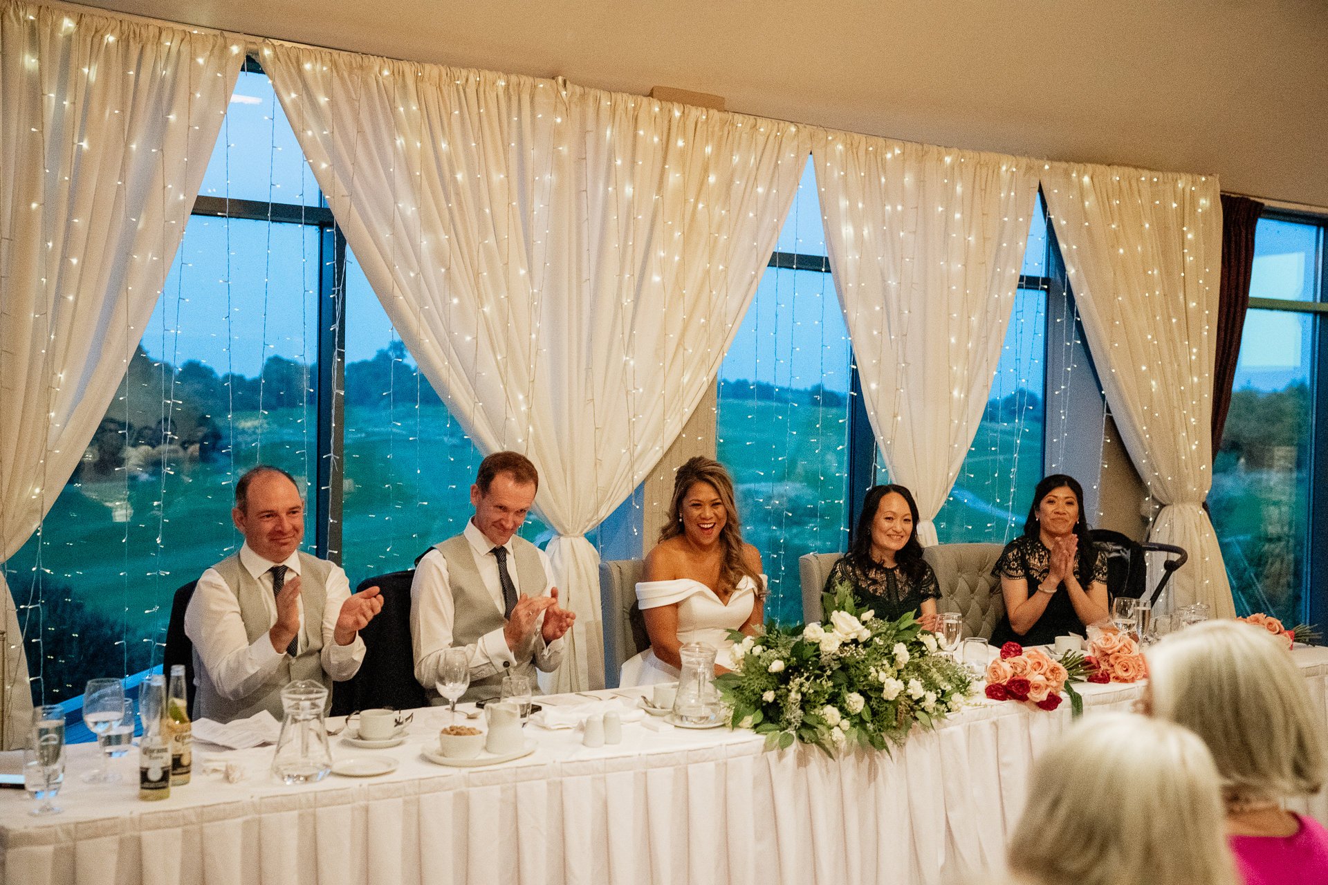 A group of people sitting at a table