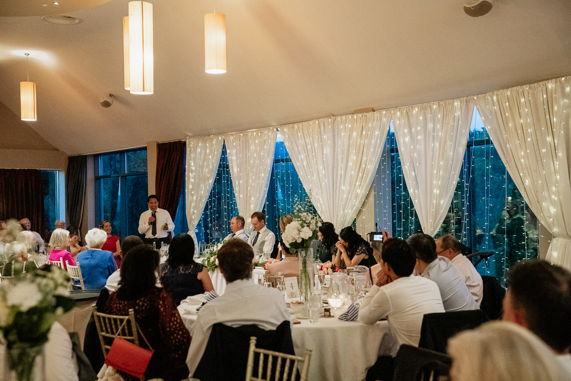 A group of people sitting at a table