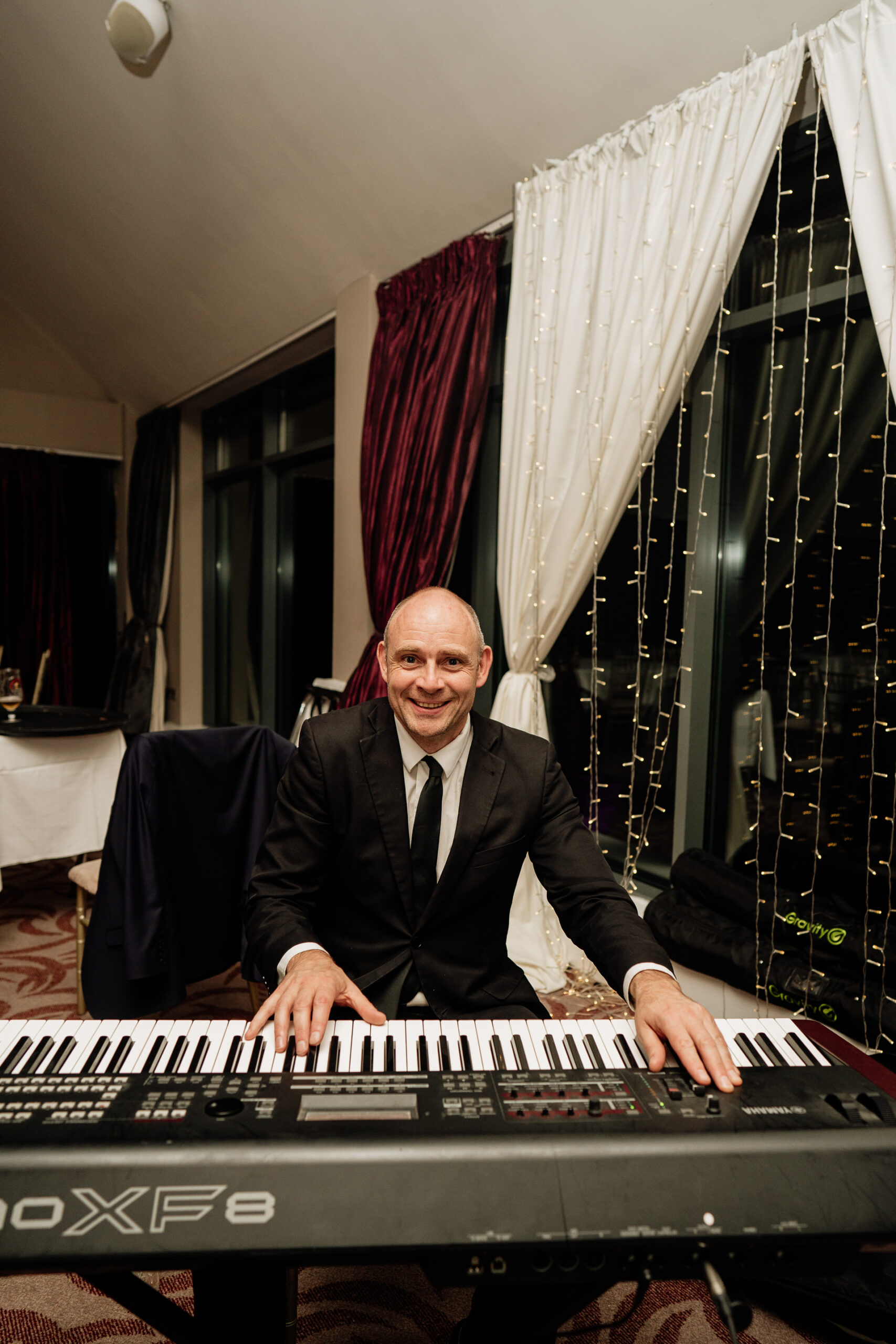 A man sitting at a piano