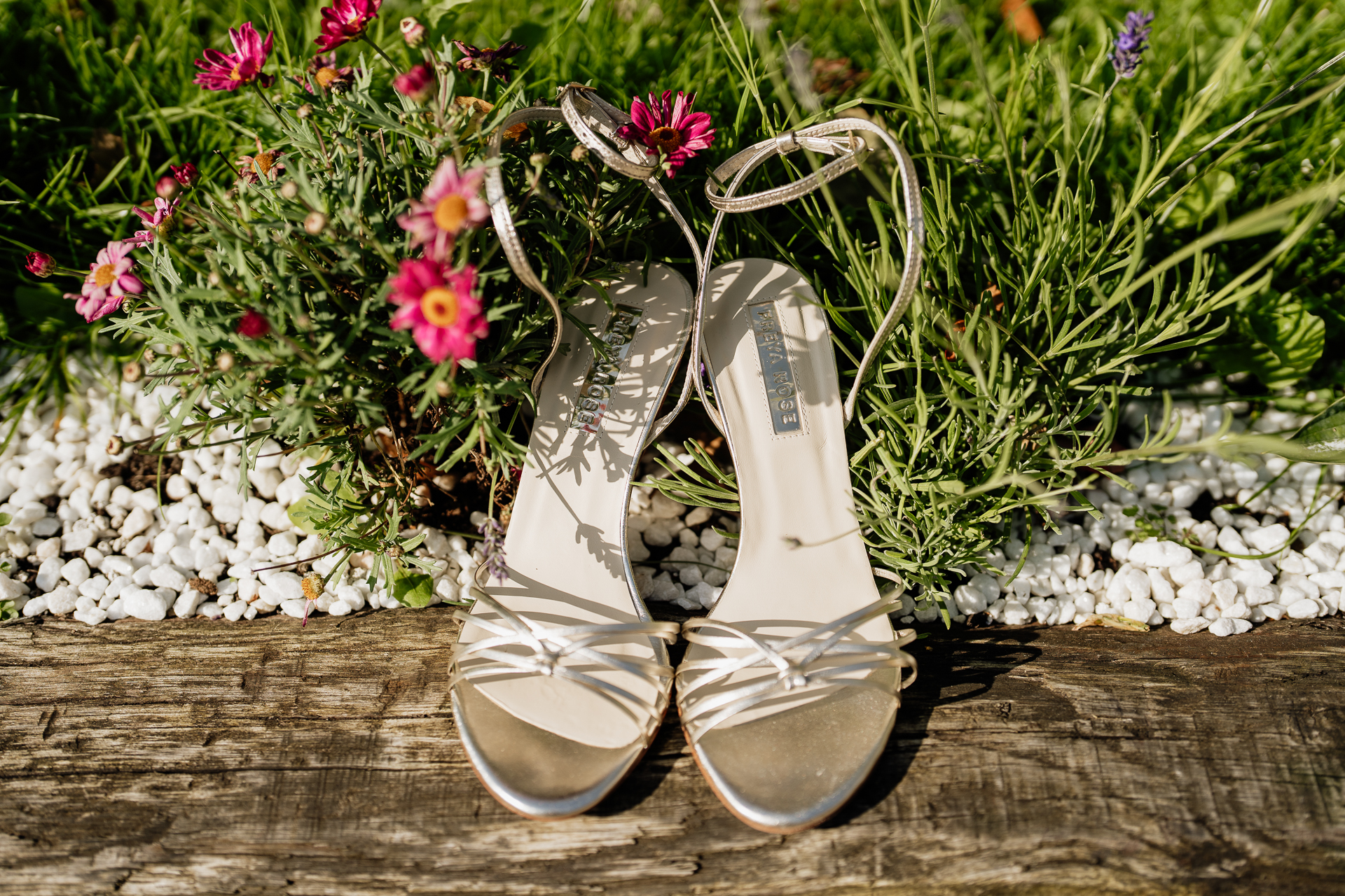 A pair of white shoes on a wooden surface