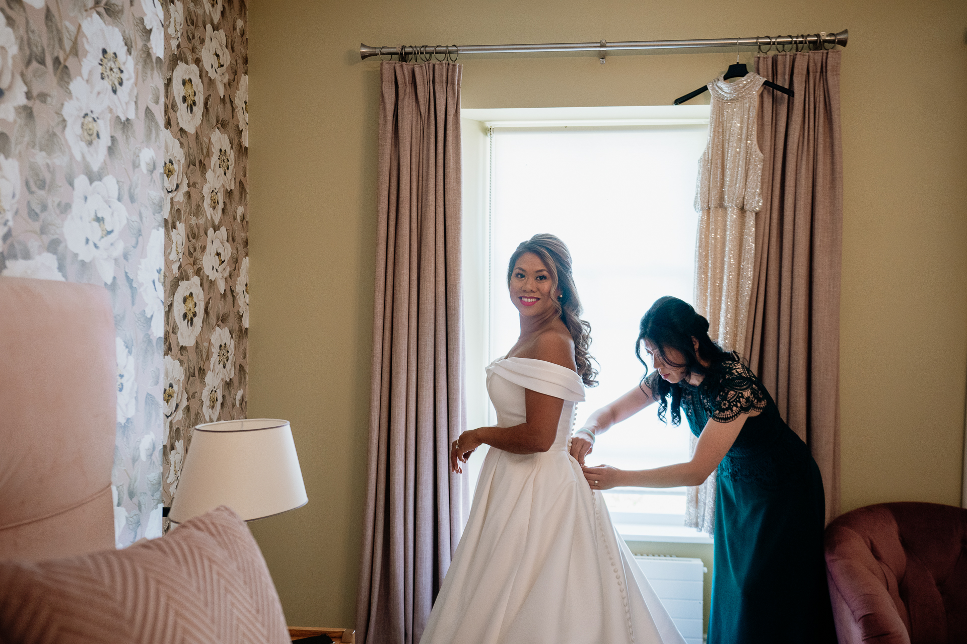 A person in a white dress and a person in a white dress