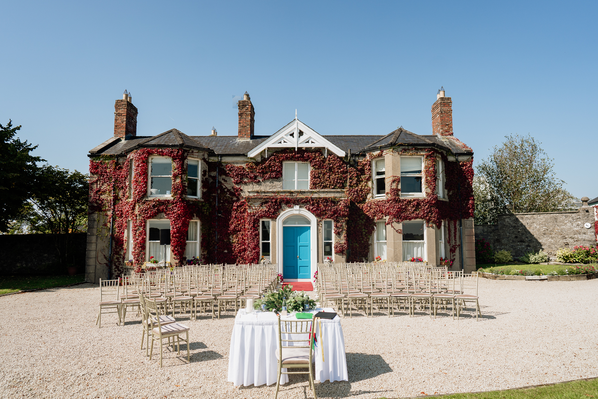 A house with a patio and tables outside