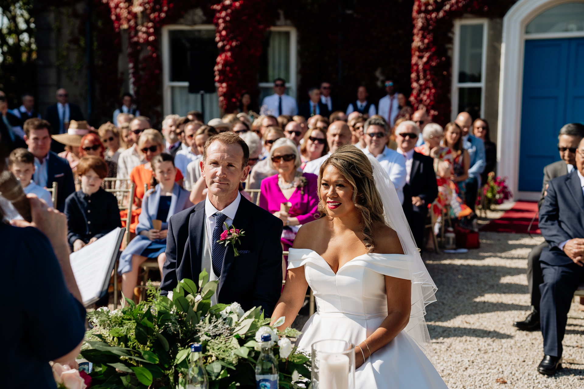 A man and woman in wedding attire