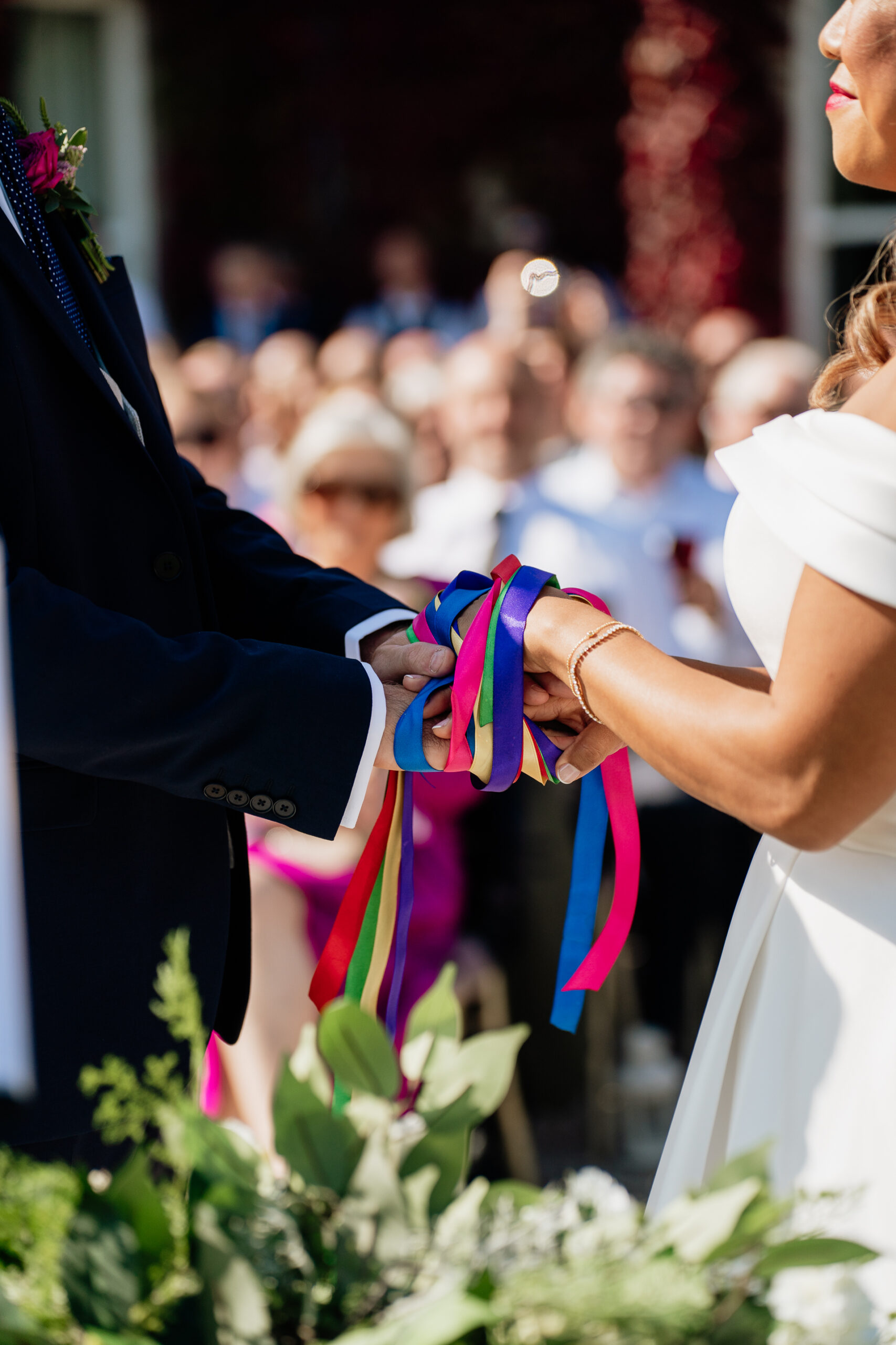 A woman holding a ribbon