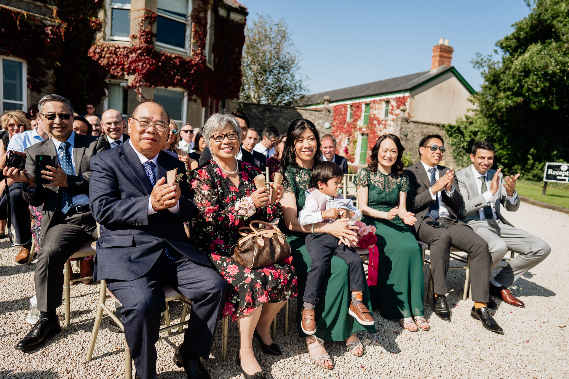 A group of people sitting on a bench