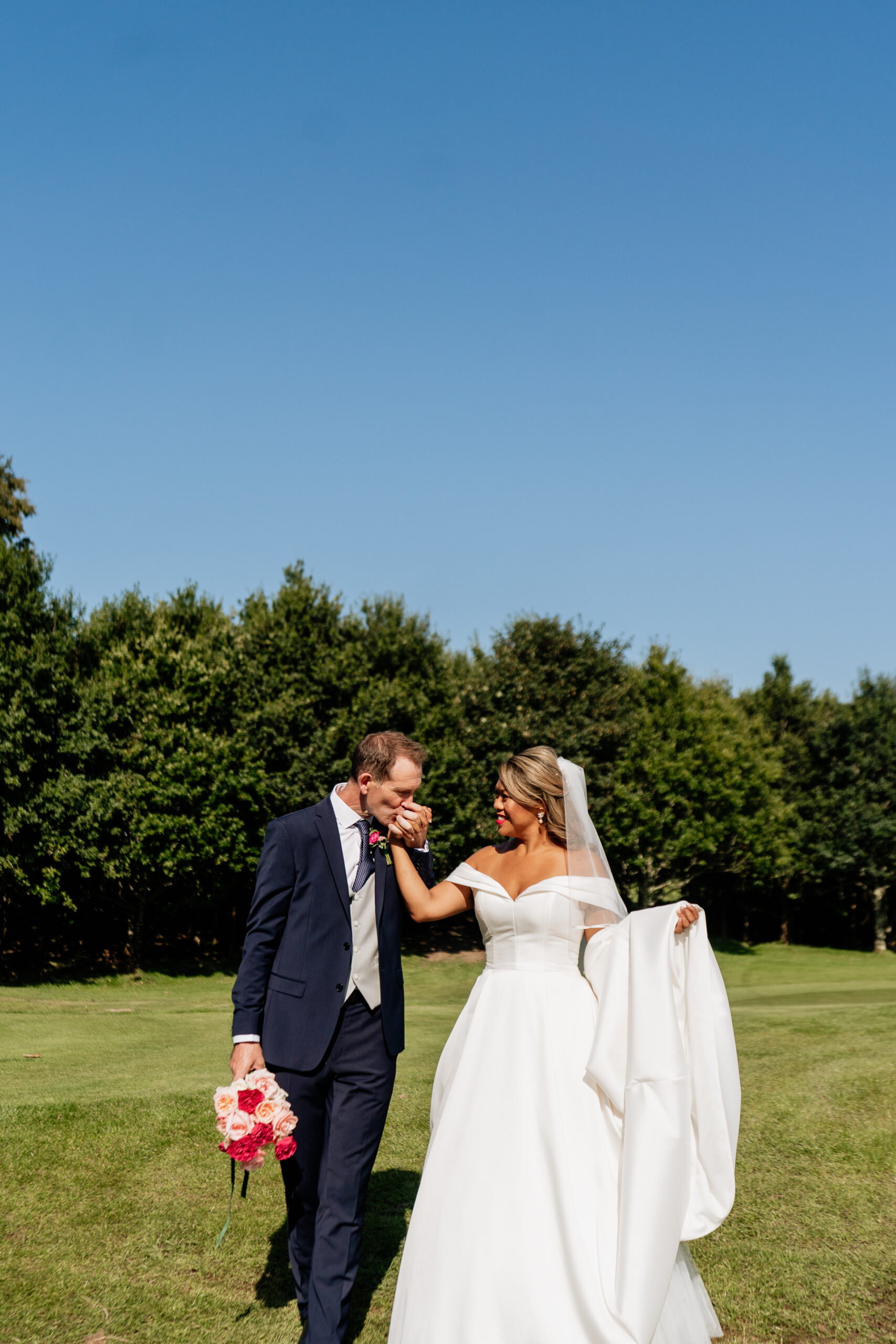 A man and woman in wedding attire