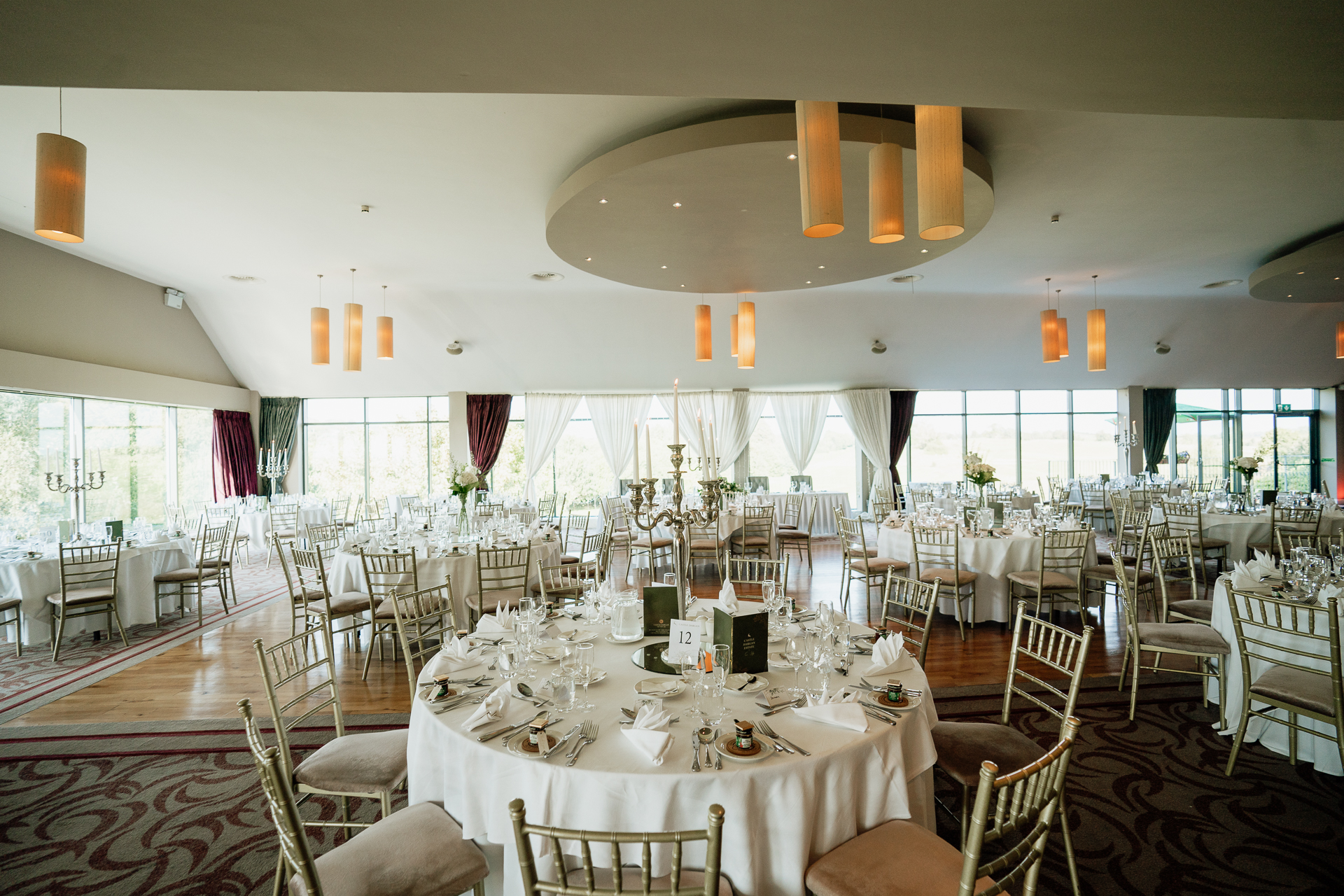 A large room with tables and chairs