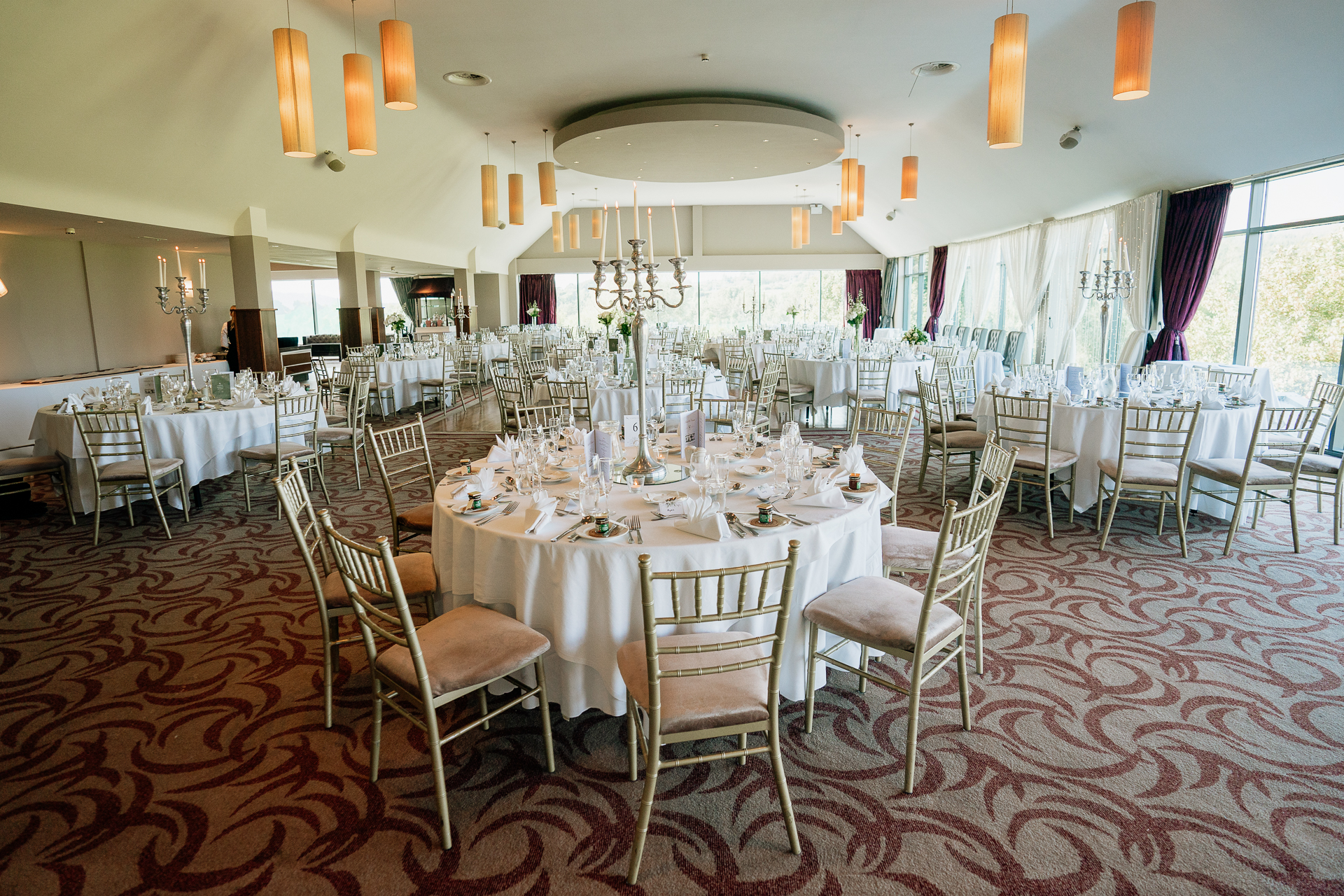 A room with tables and chairs