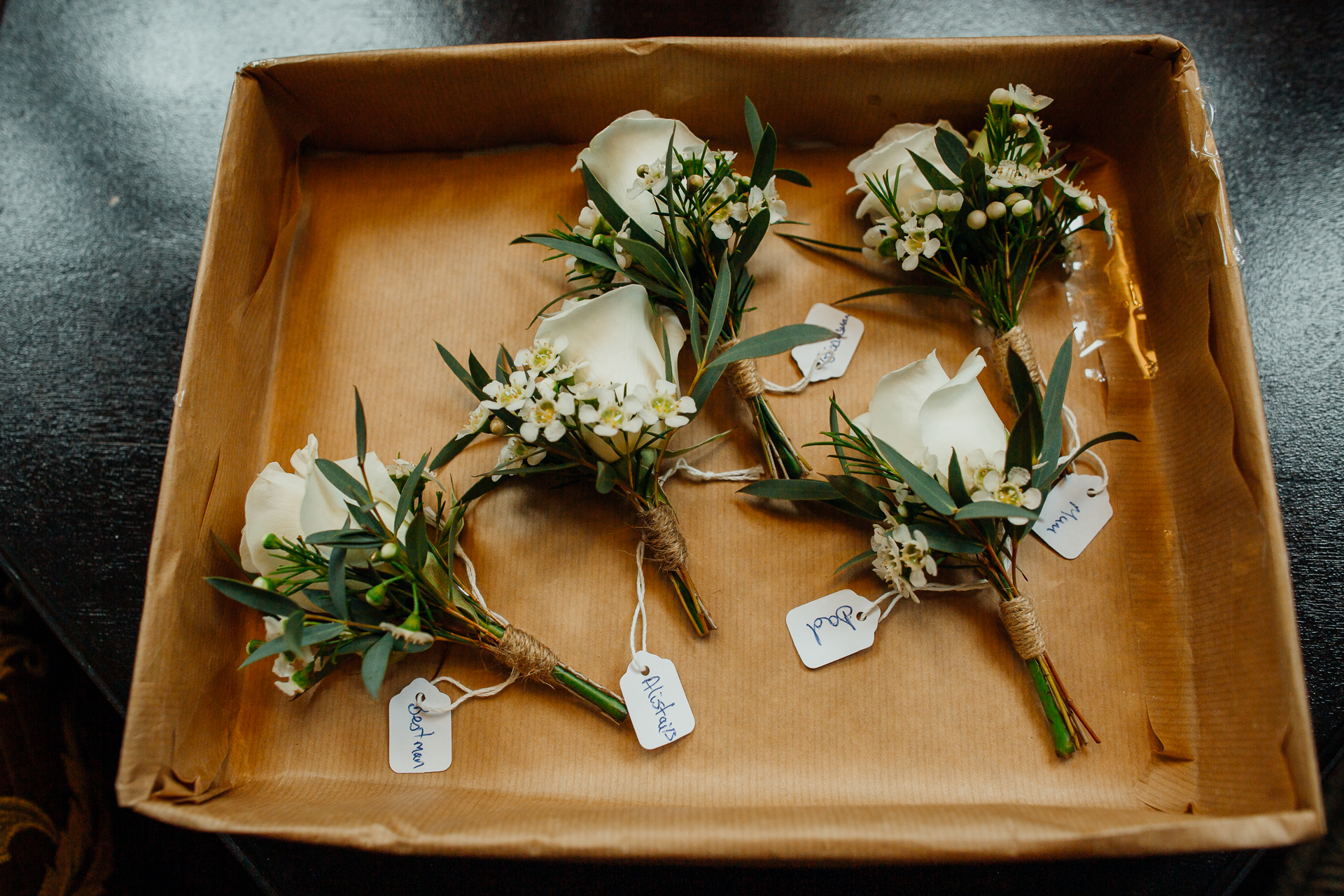 A tray with flowers and cards on it