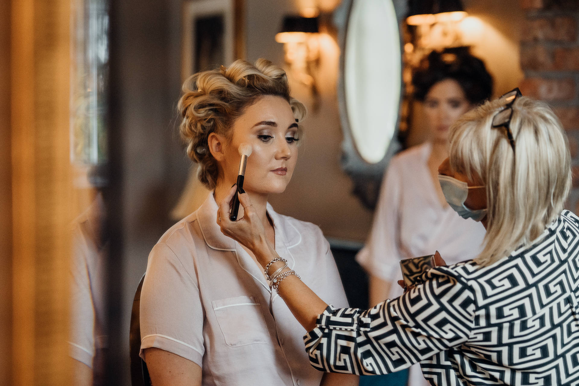 A woman looking at another woman