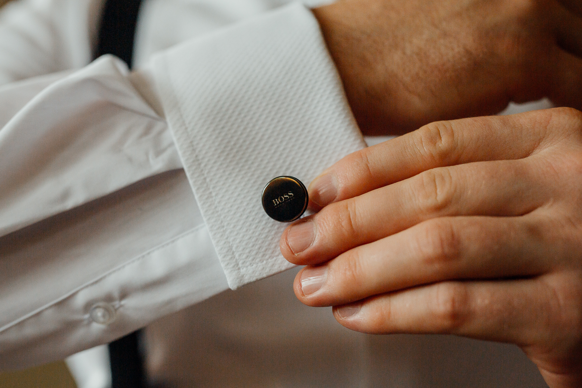 A close-up of a person holding a coin