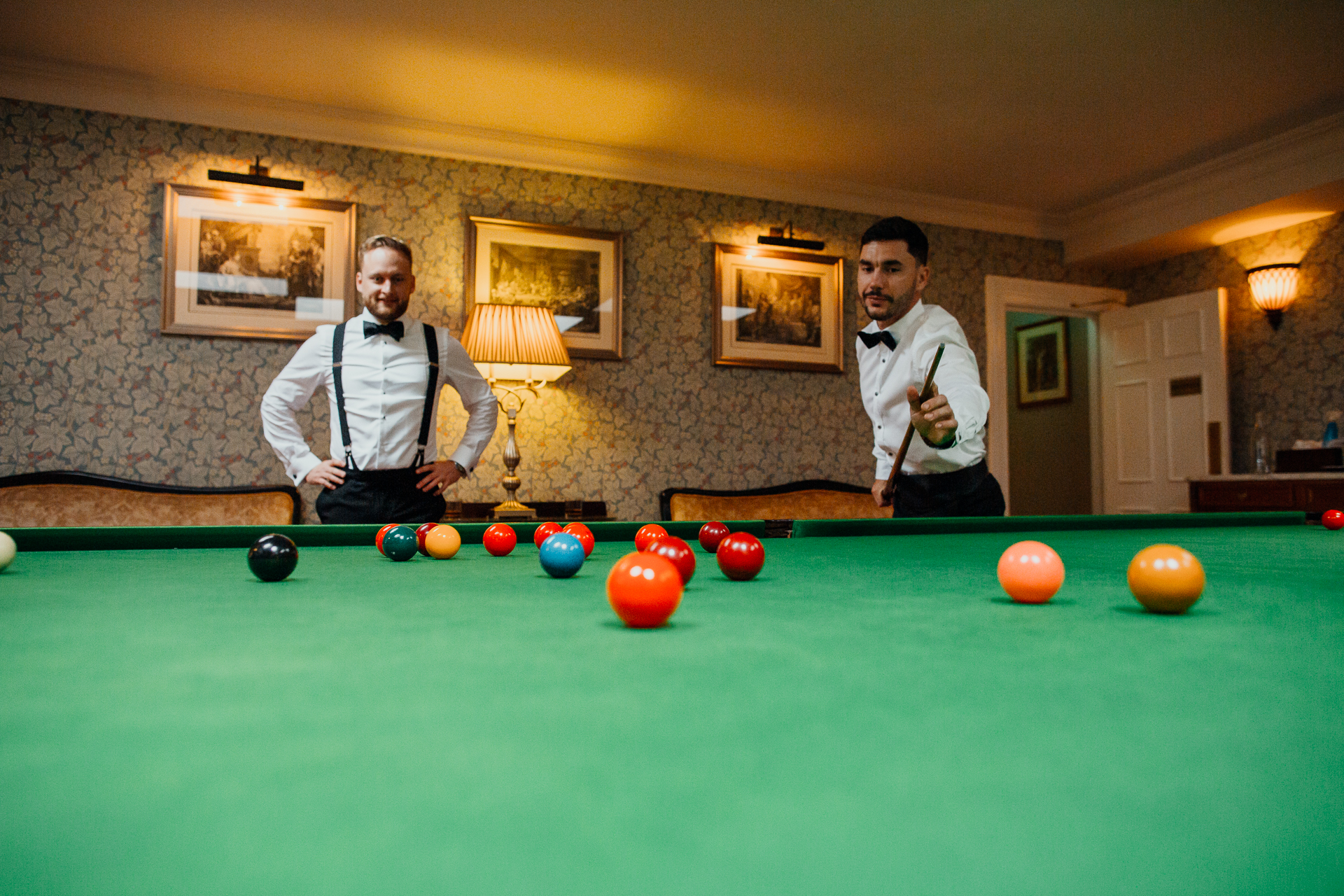 Two men playing pool