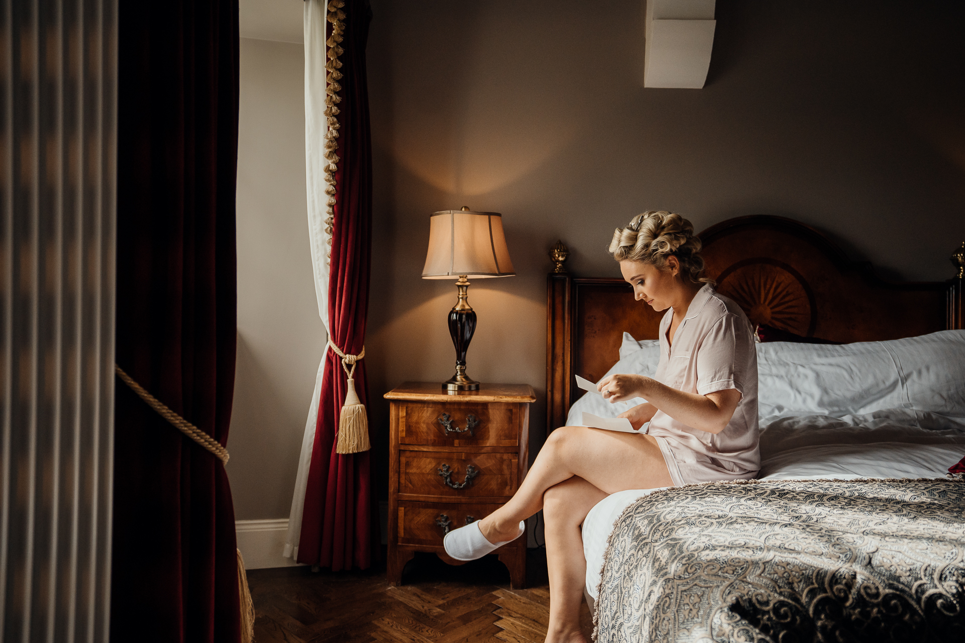 A person sitting on a bed