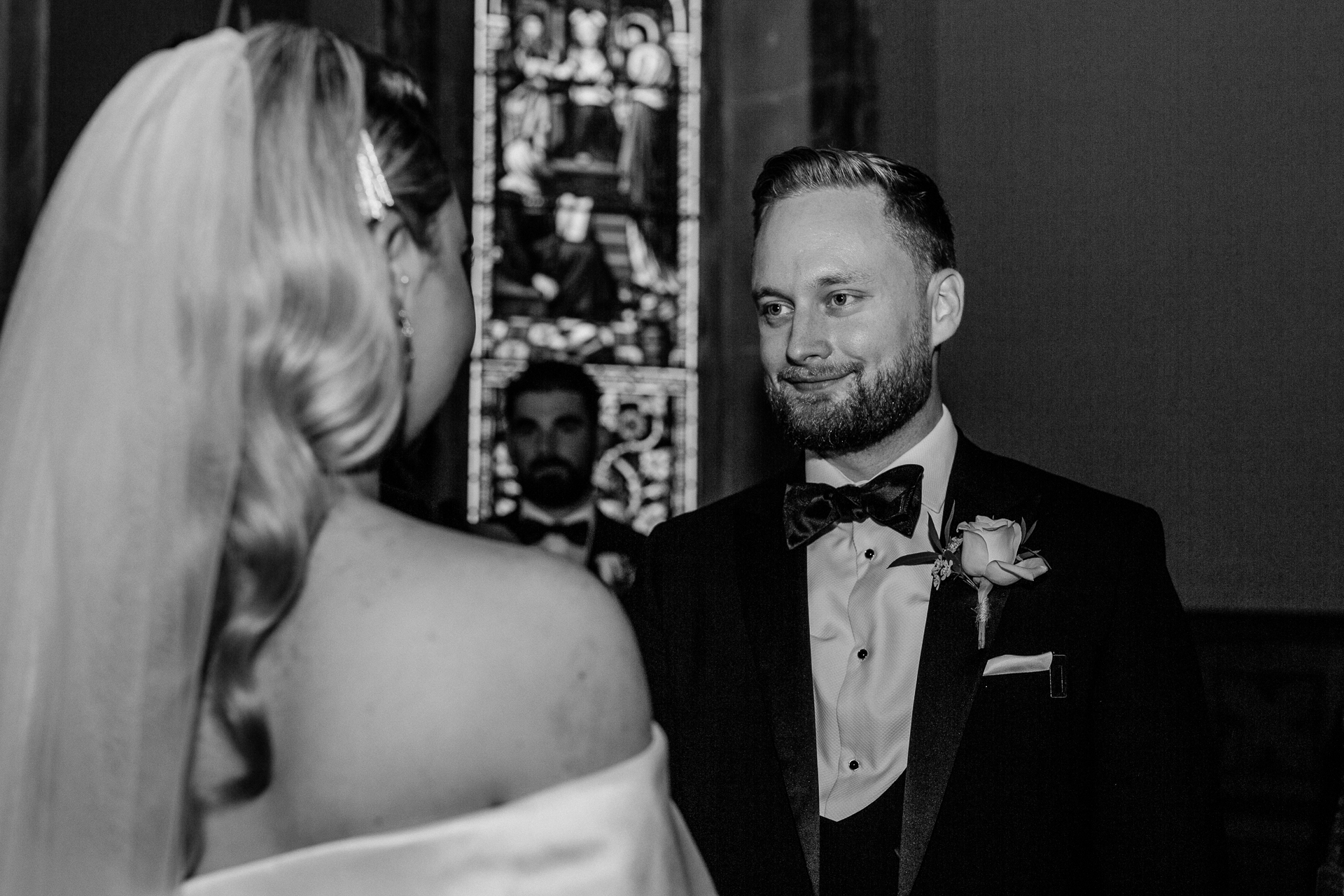 A man in a tuxedo and a woman in a dress