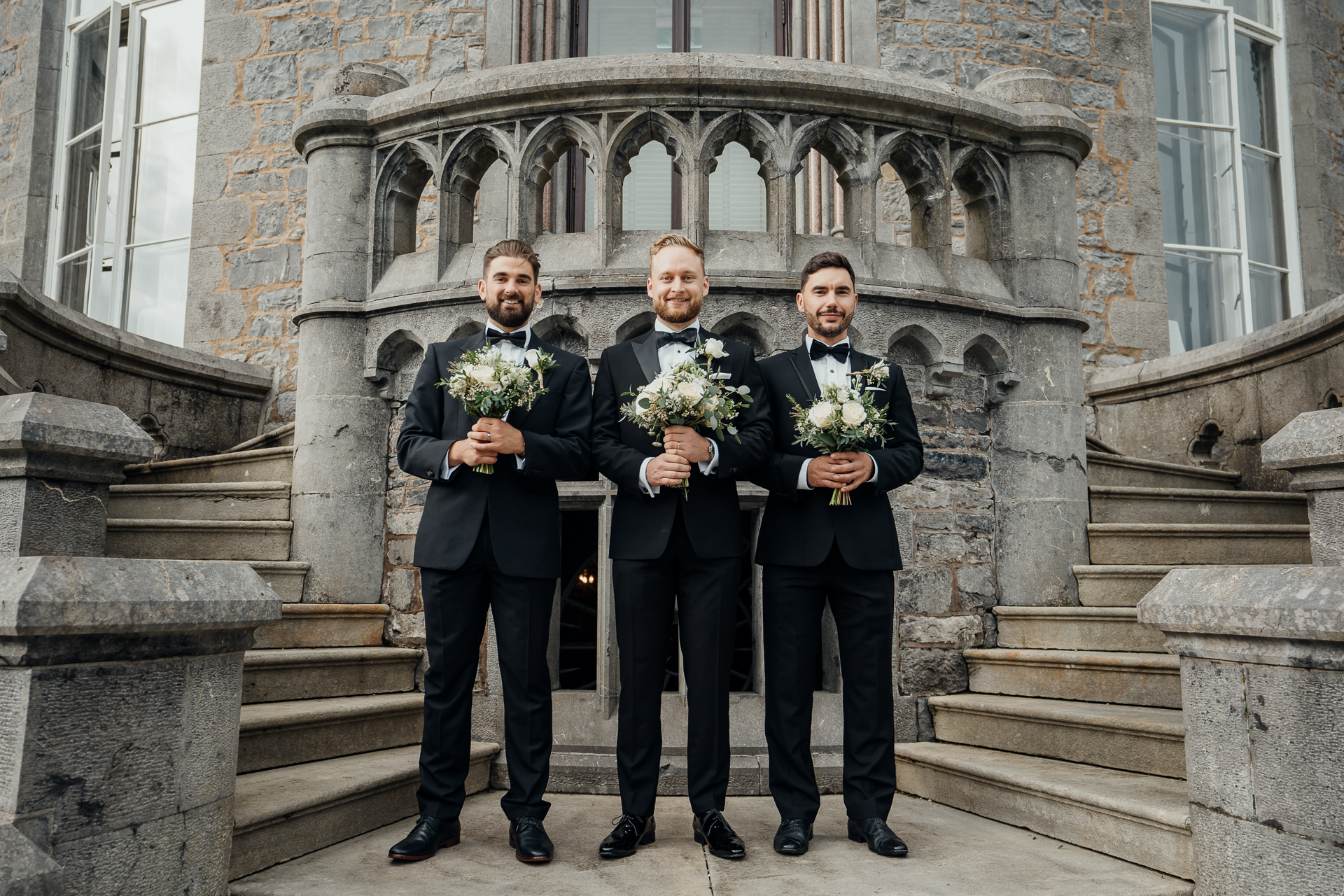 A group of men posing for a picture