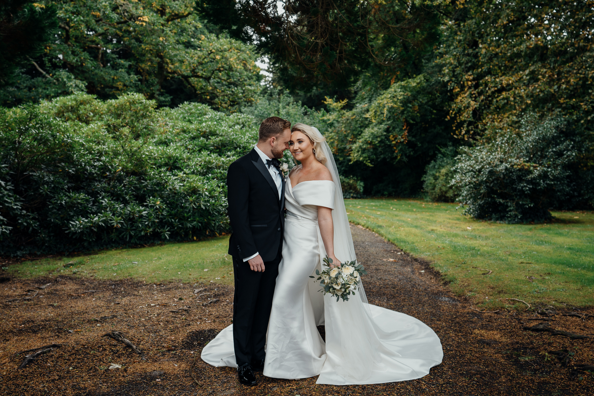 A man and woman in wedding attire