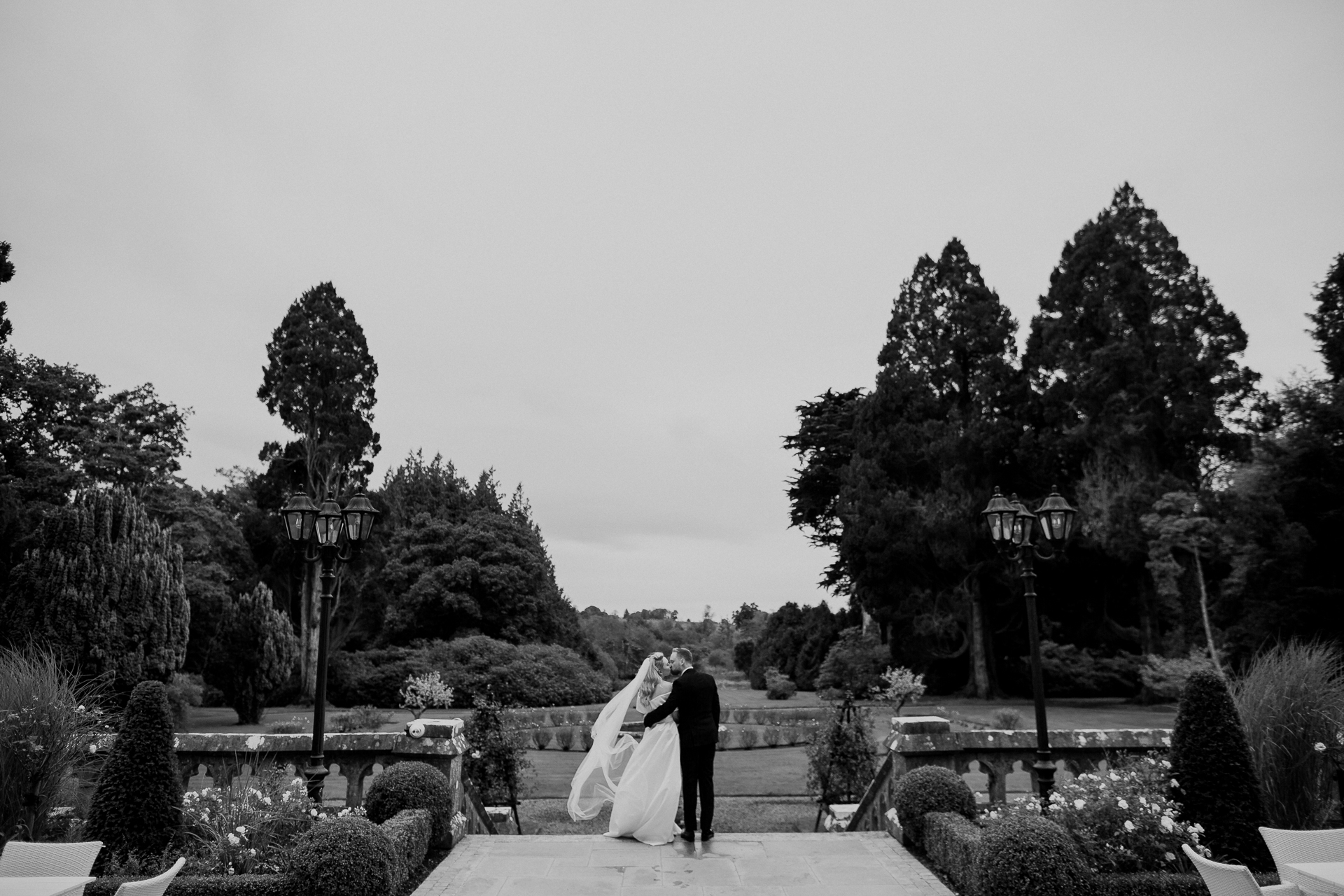 A bride and groom kissing