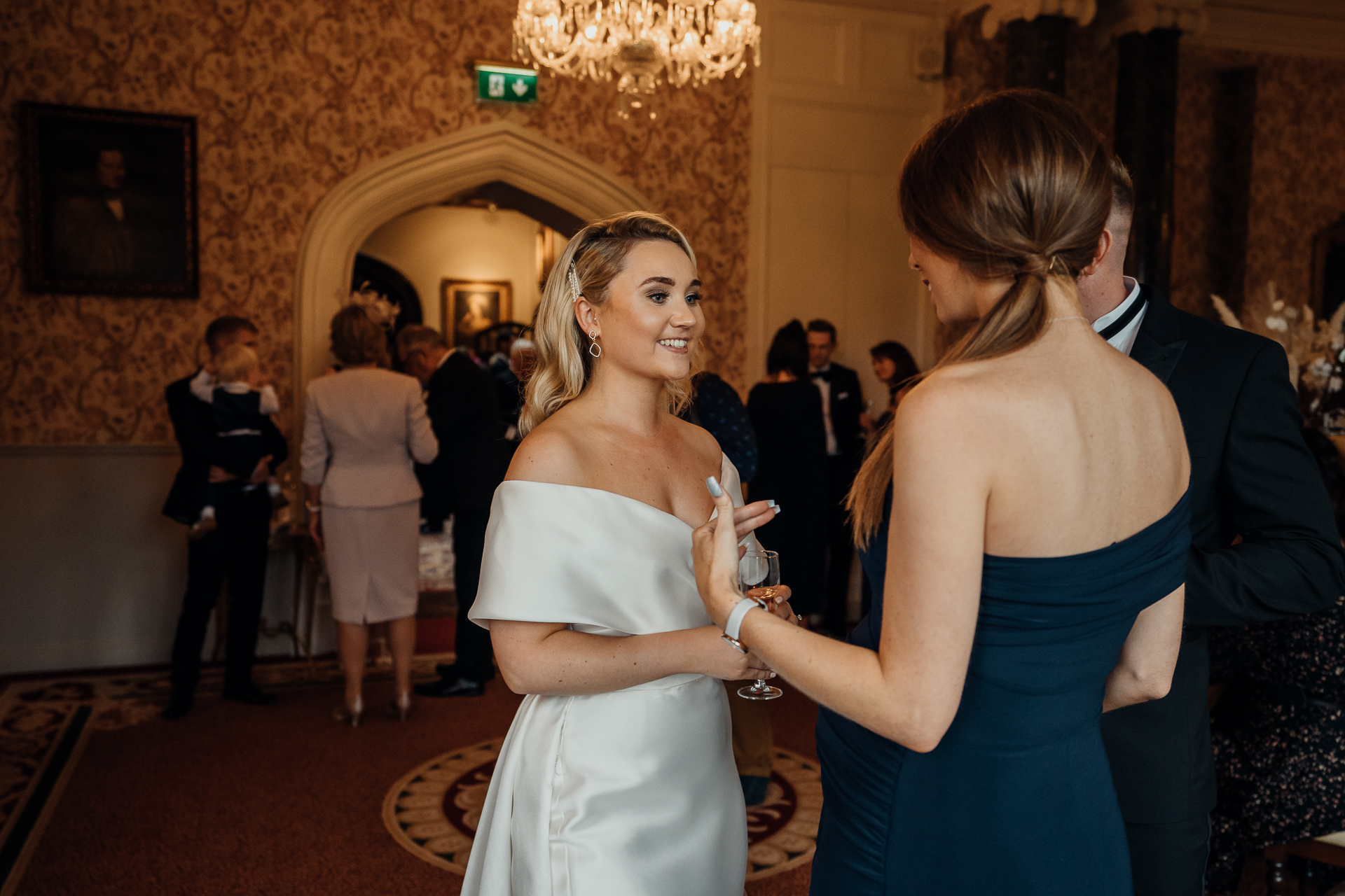 A person in a white dress and a person in a white dress