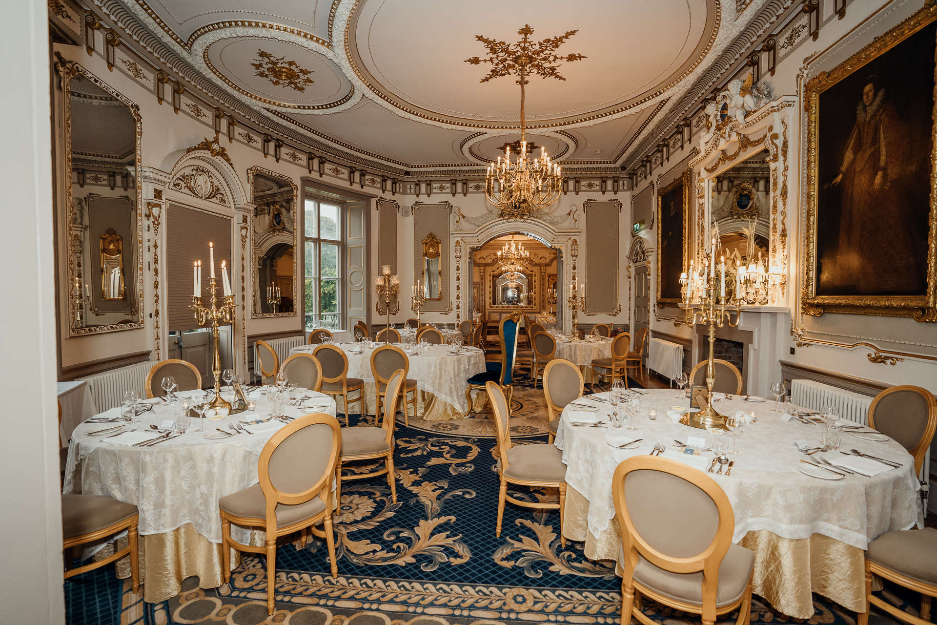 A dining room with tables and chairs