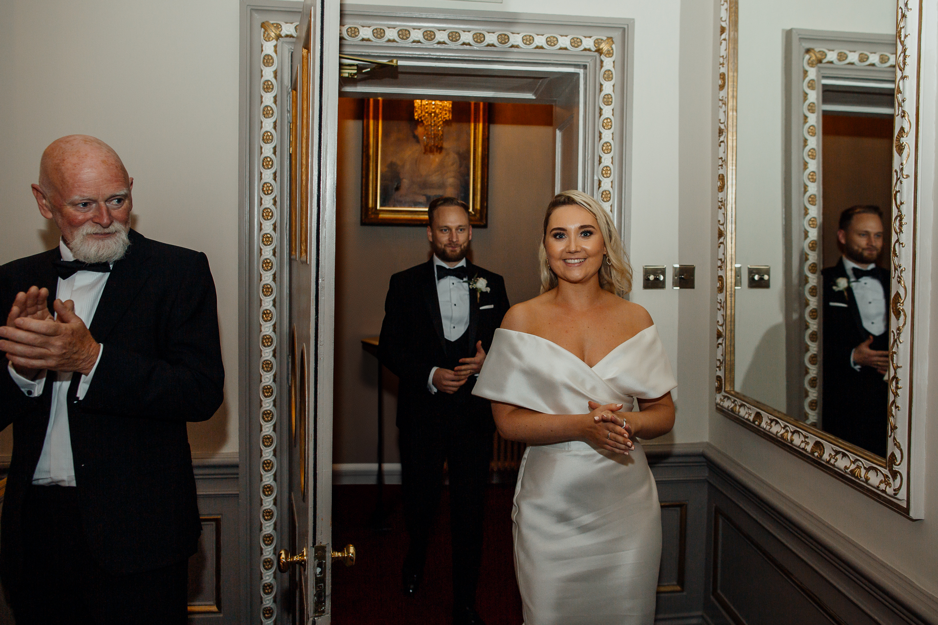 A bride and groom in a room