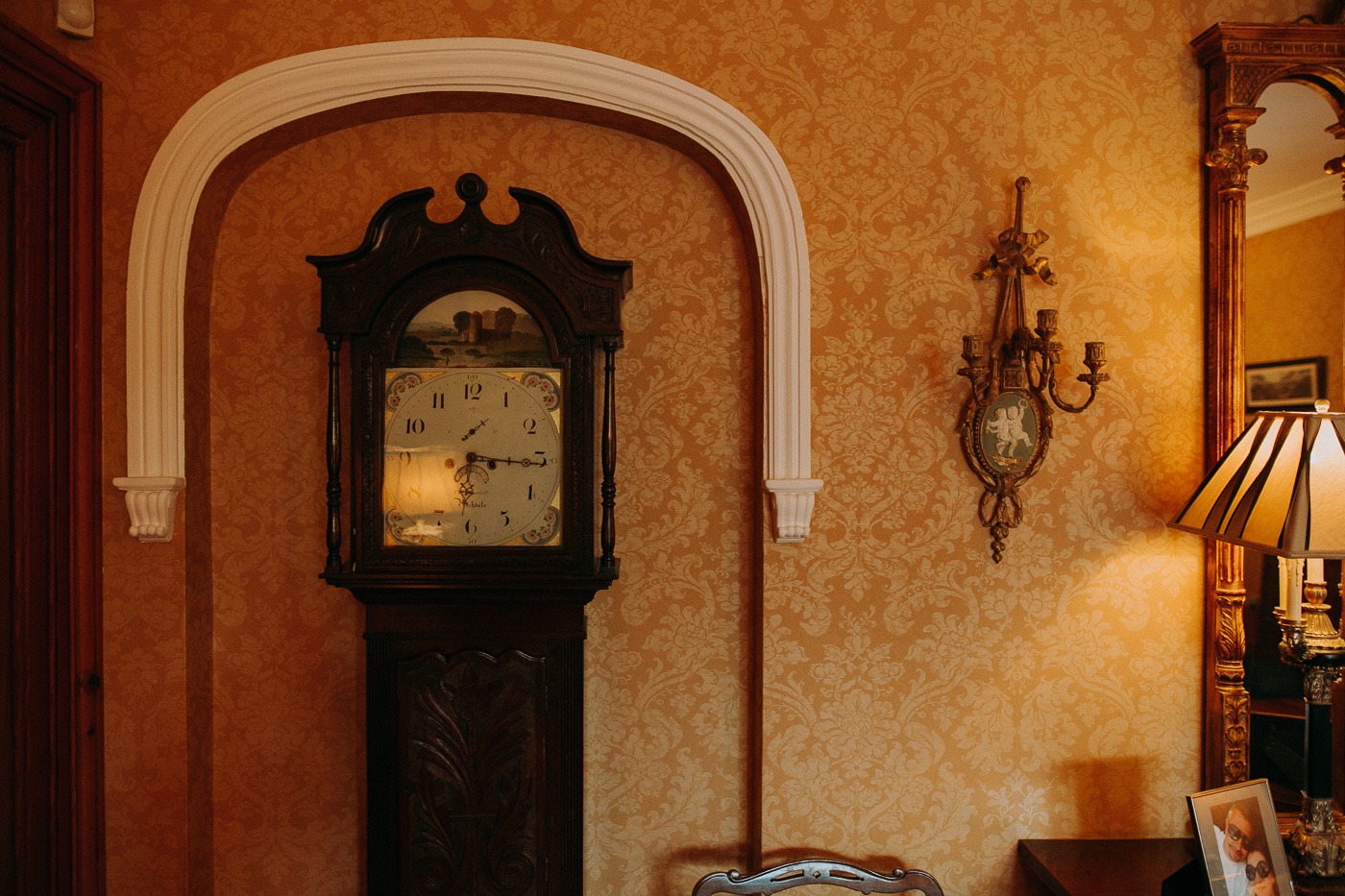 A clock sitting in the middle of a room