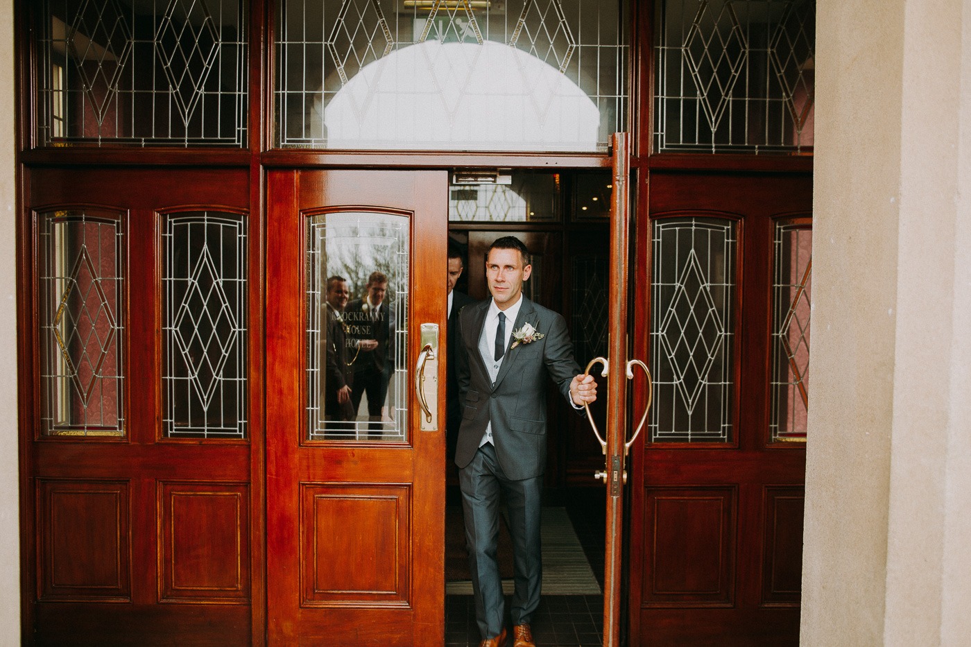 A person standing in front of a door