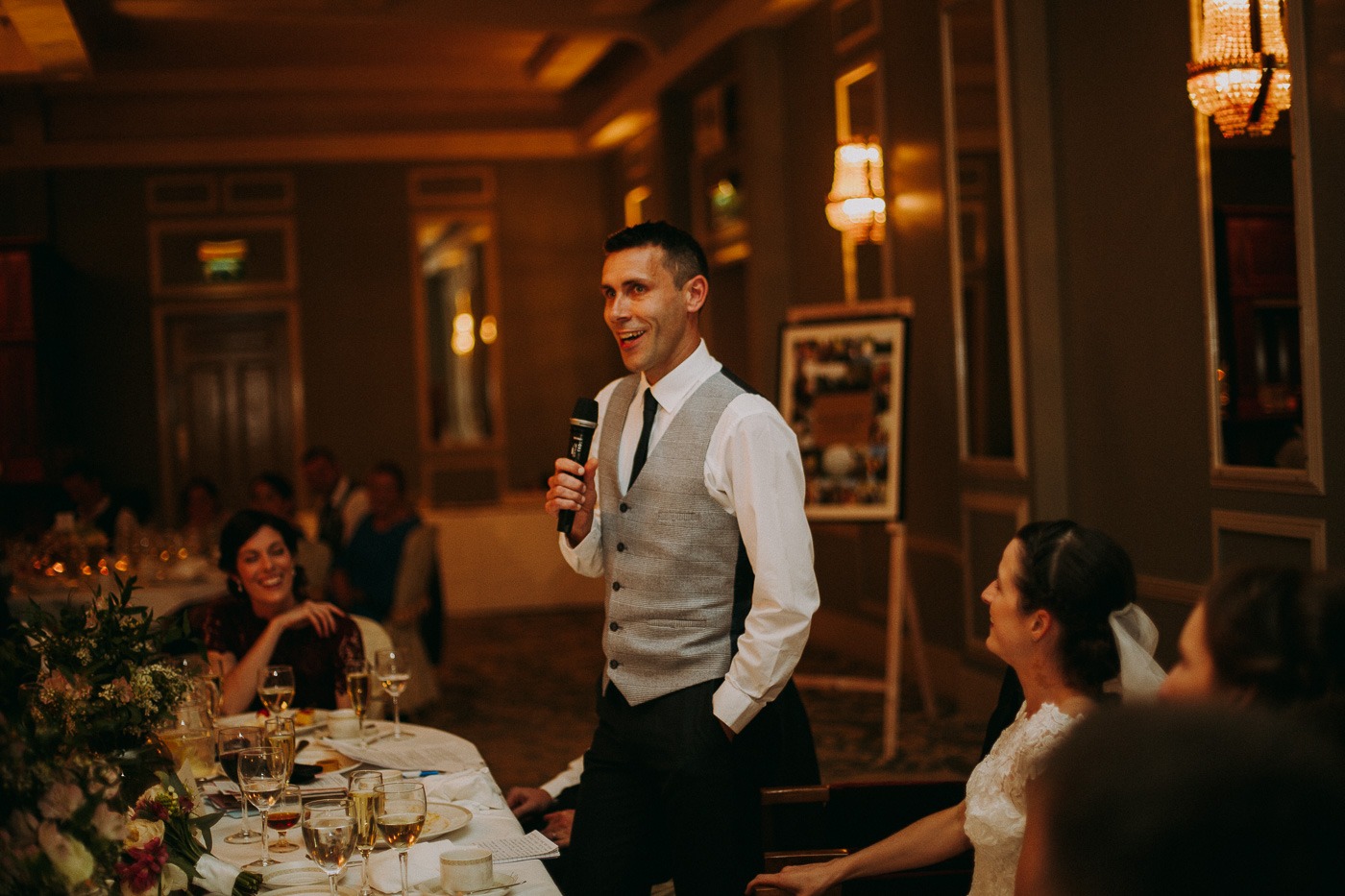 A group of people standing around a table