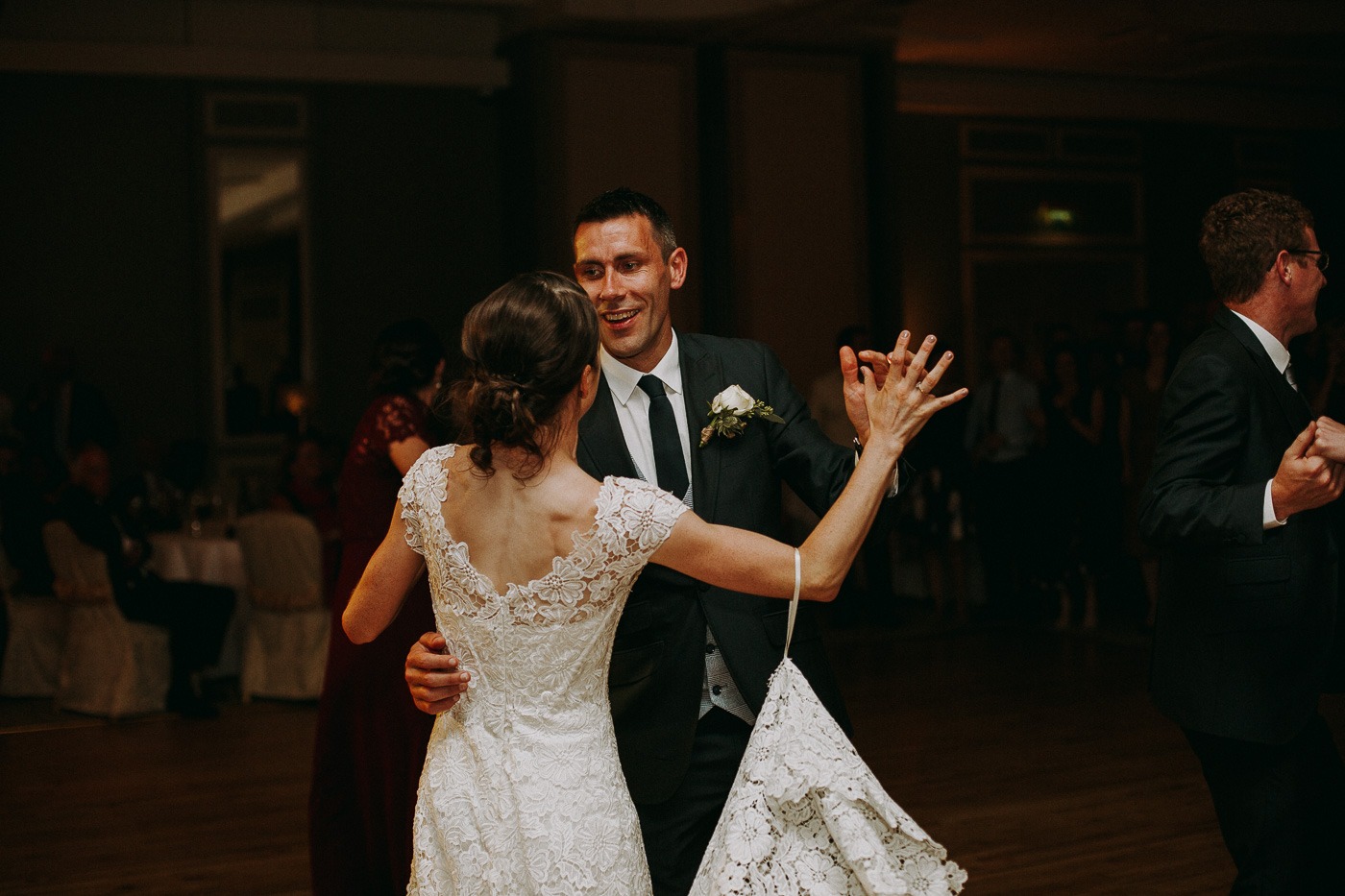 A man and a woman in a wedding dress