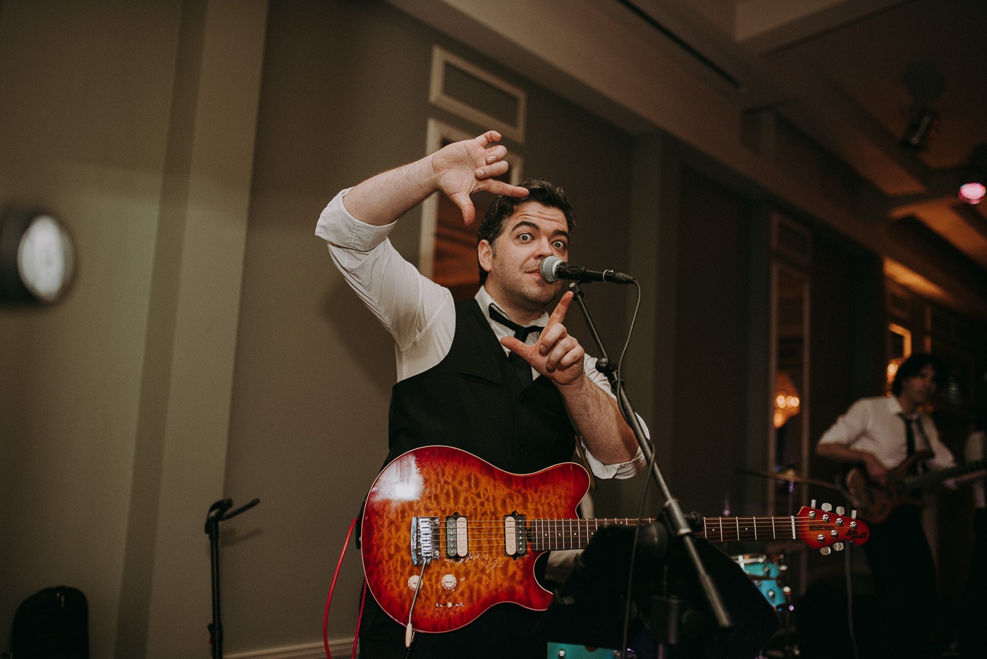 A man holding a guitar