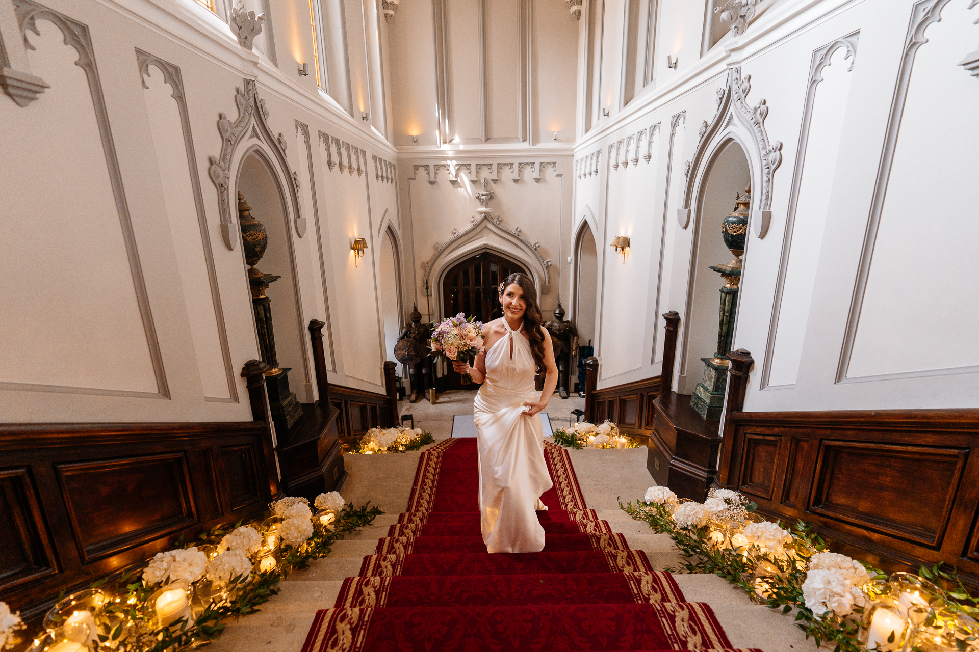 Wedding ceremony in the historic chapel at Markree Castle with natural light and emotional moments