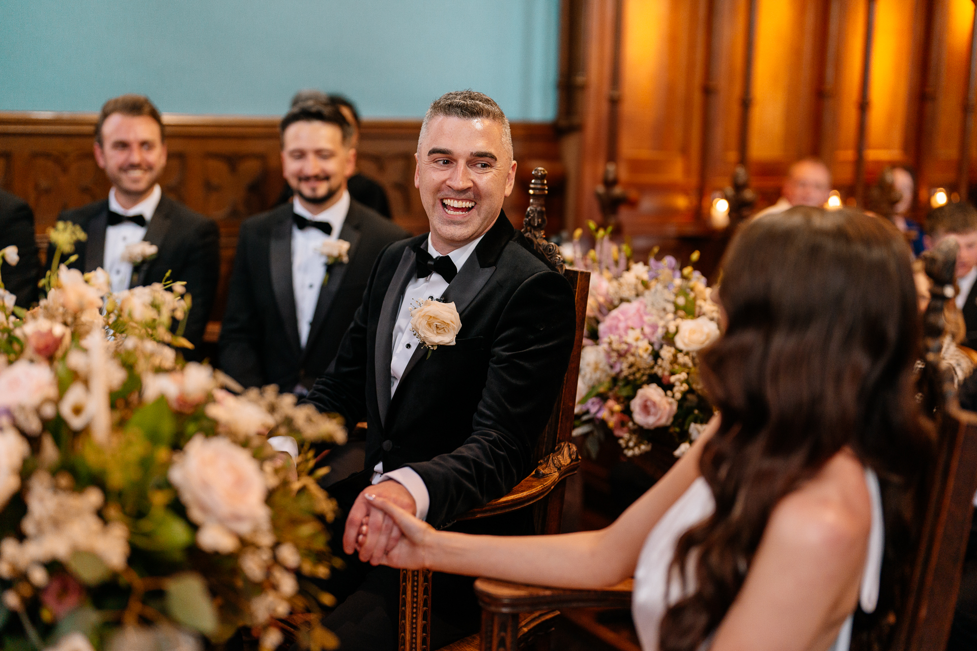 Wedding ceremony in the historic chapel at Markree Castle with natural light and emotional moments