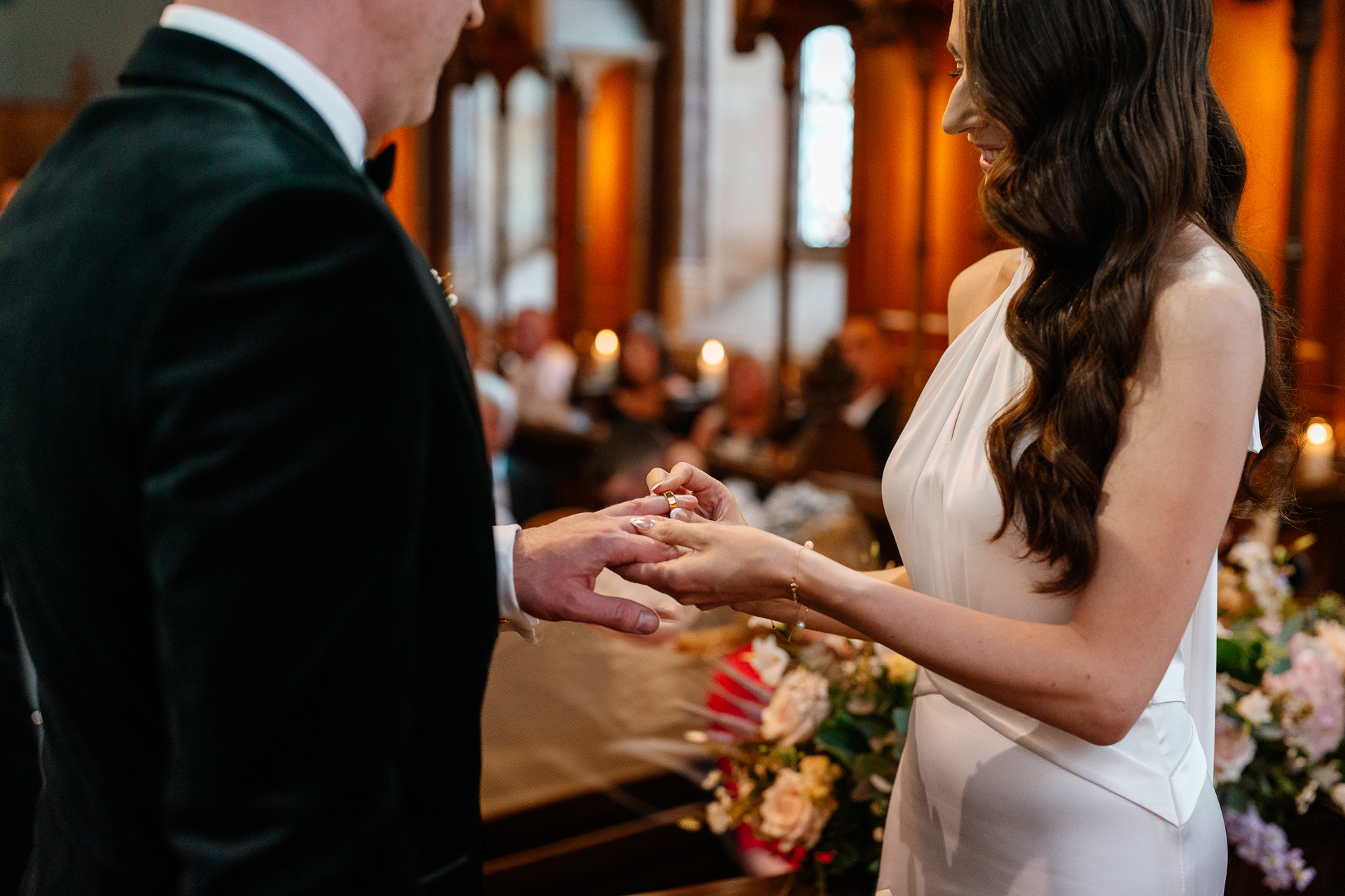 Wedding ceremony in the historic chapel at Markree Castle with natural light and emotional moments