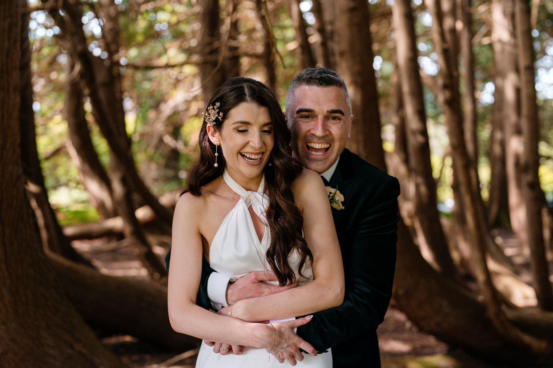 Bride and Groom walking through the garden at Markree Castle on their wedding day