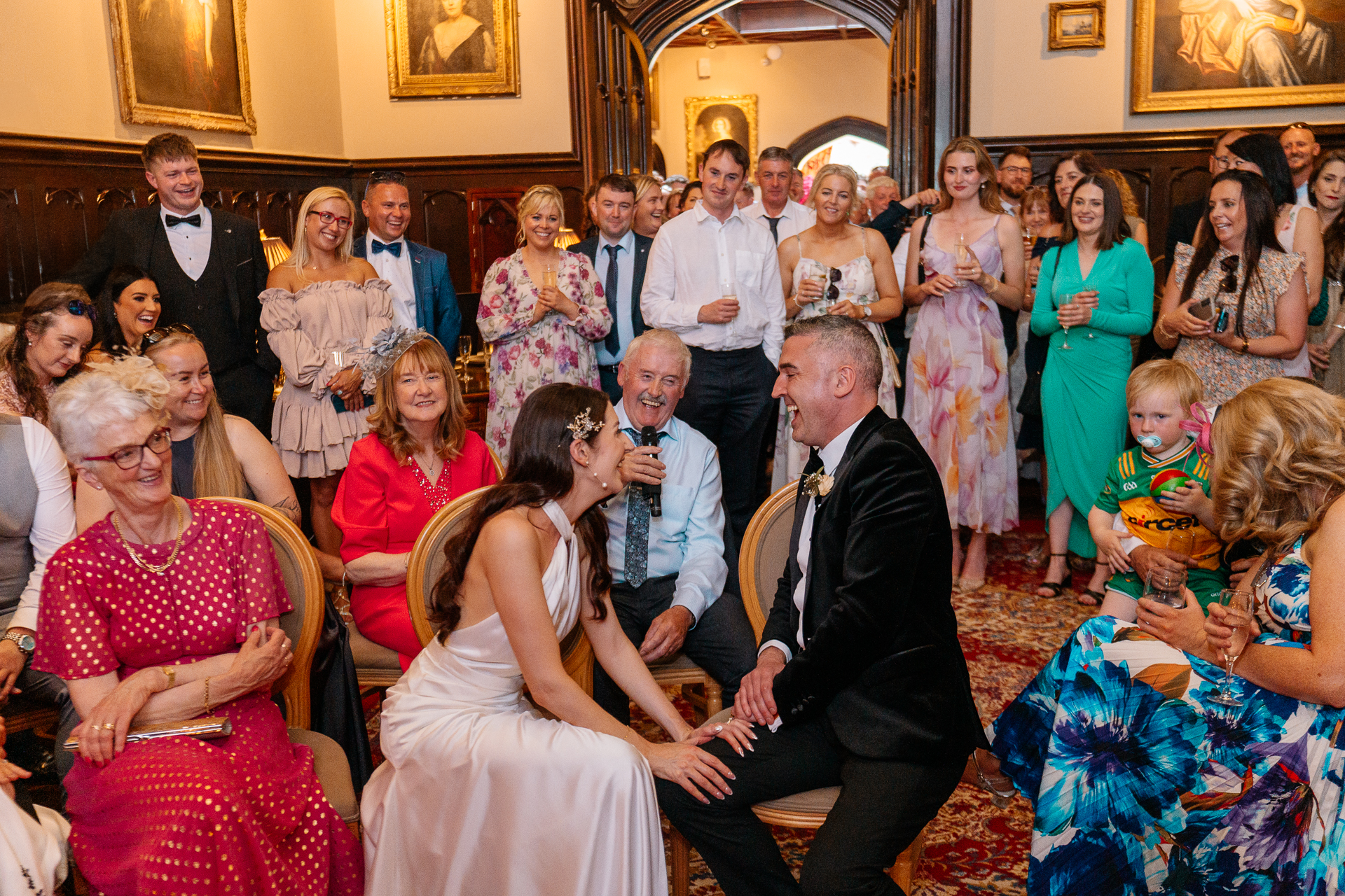 Bride and groom on castle staircase at Markree Castle – romantic wedding portrait