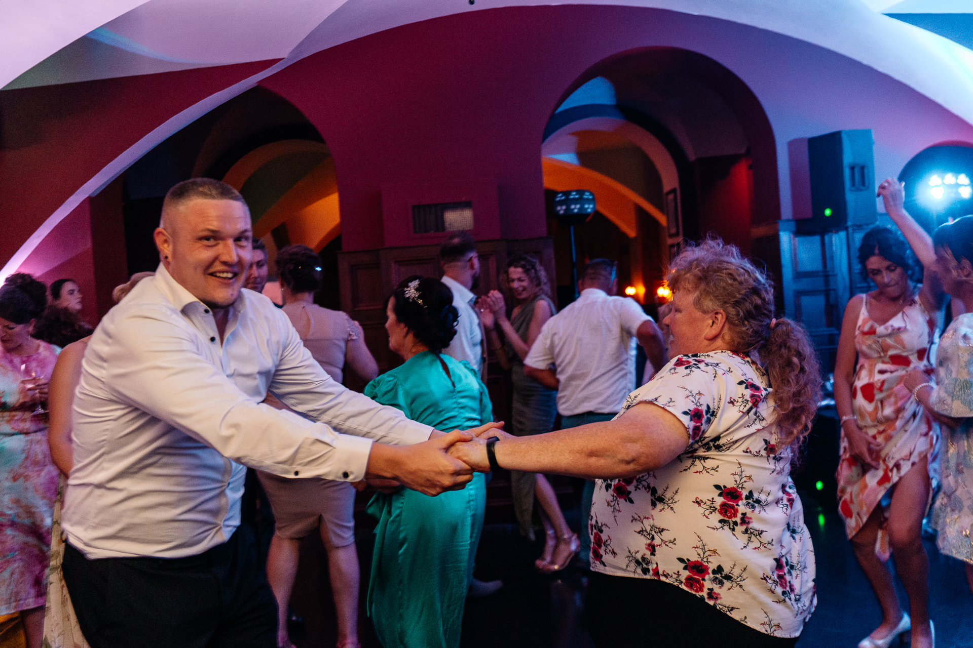 Wedding guests dancing joyfully on the dance floor during a Markree Castle reception